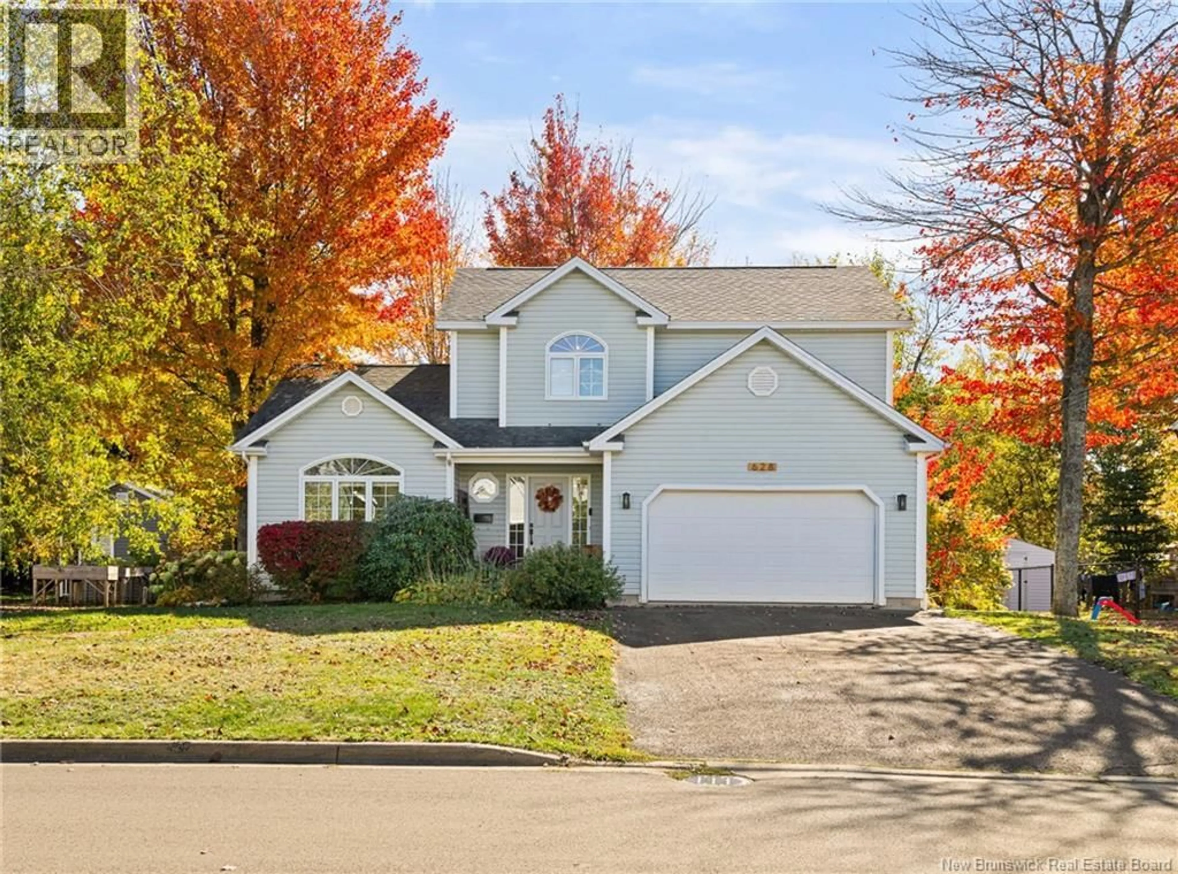 Home with vinyl exterior material, street for 628 CLARENCE CORMIER STREET, Dieppe New Brunswick E1A7T3