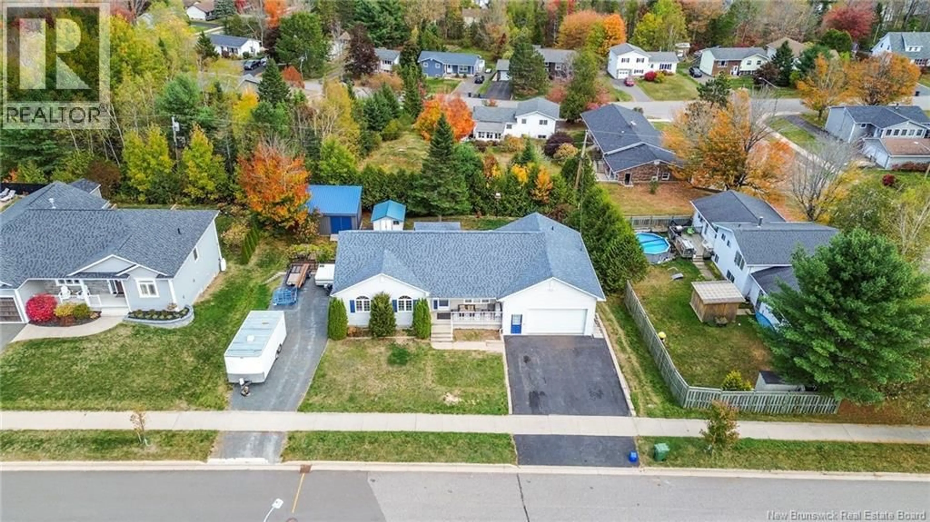 A pic from outside/outdoor area/front of a property/back of a property/a pic from drone, street for 116 SPRUCEWOOD DRIVE, New Maryland New Brunswick E3C1C5