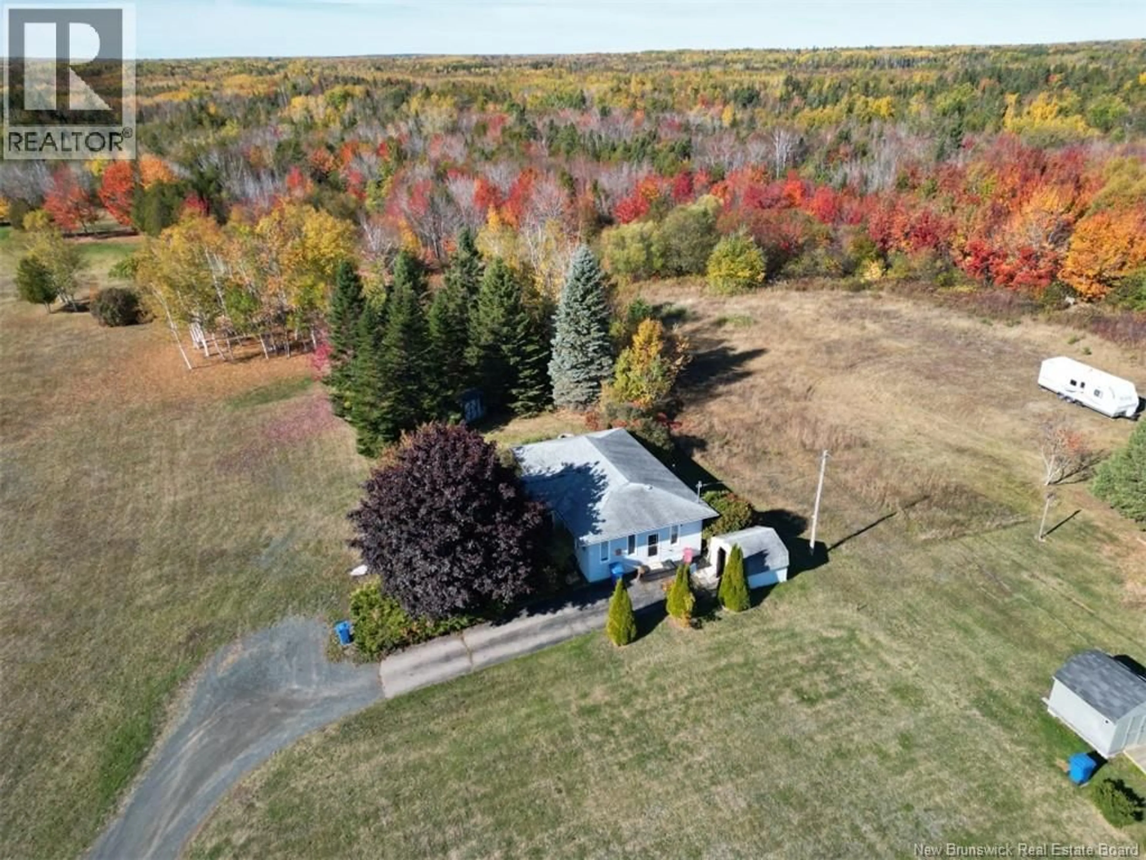 A pic from outside/outdoor area/front of a property/back of a property/a pic from drone, unknown for 564 PRINCIPALE, Beresford New Brunswick E8K2A8