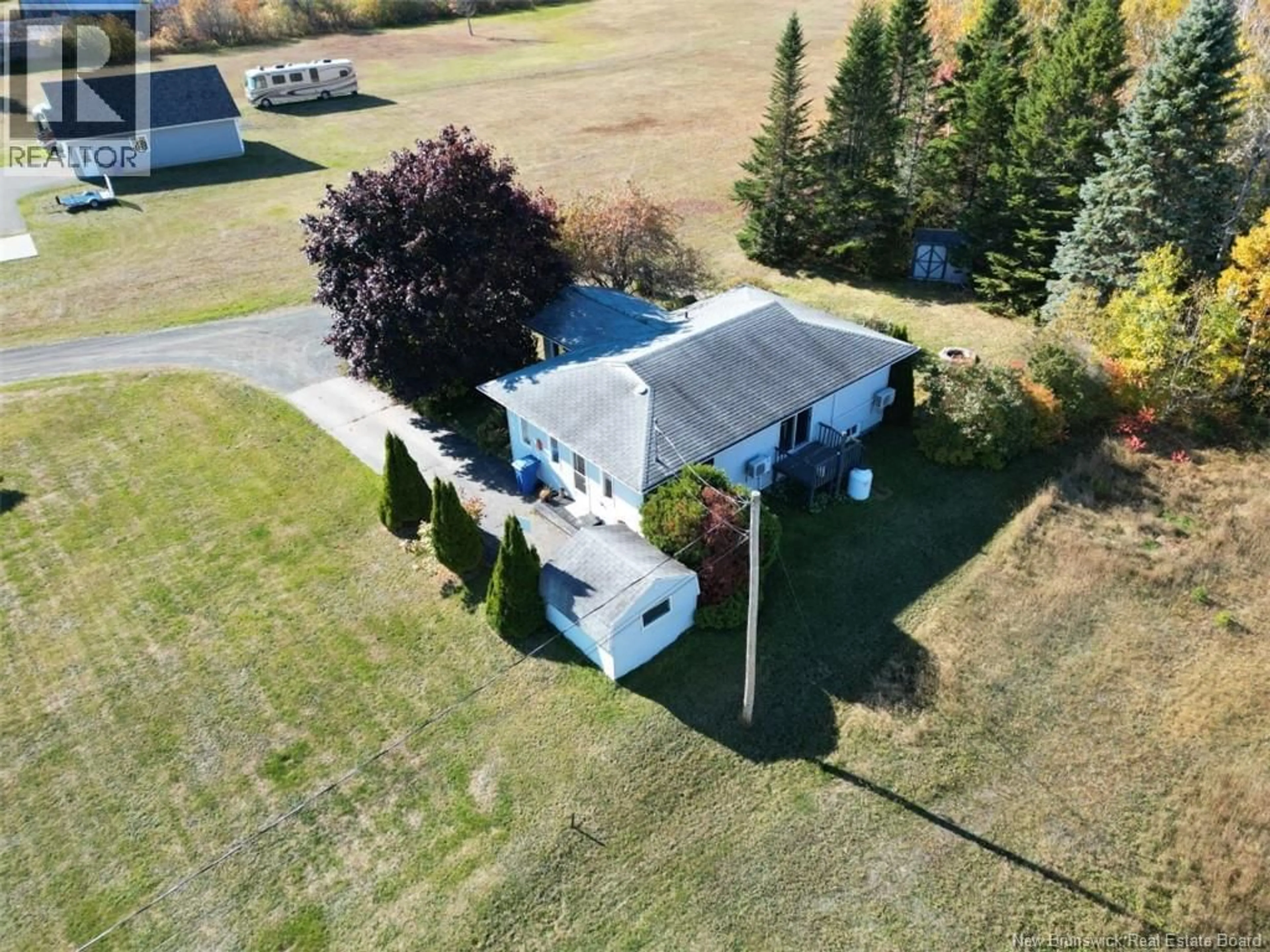 A pic from outside/outdoor area/front of a property/back of a property/a pic from drone, unknown for 564 PRINCIPALE, Beresford New Brunswick E8K2A8