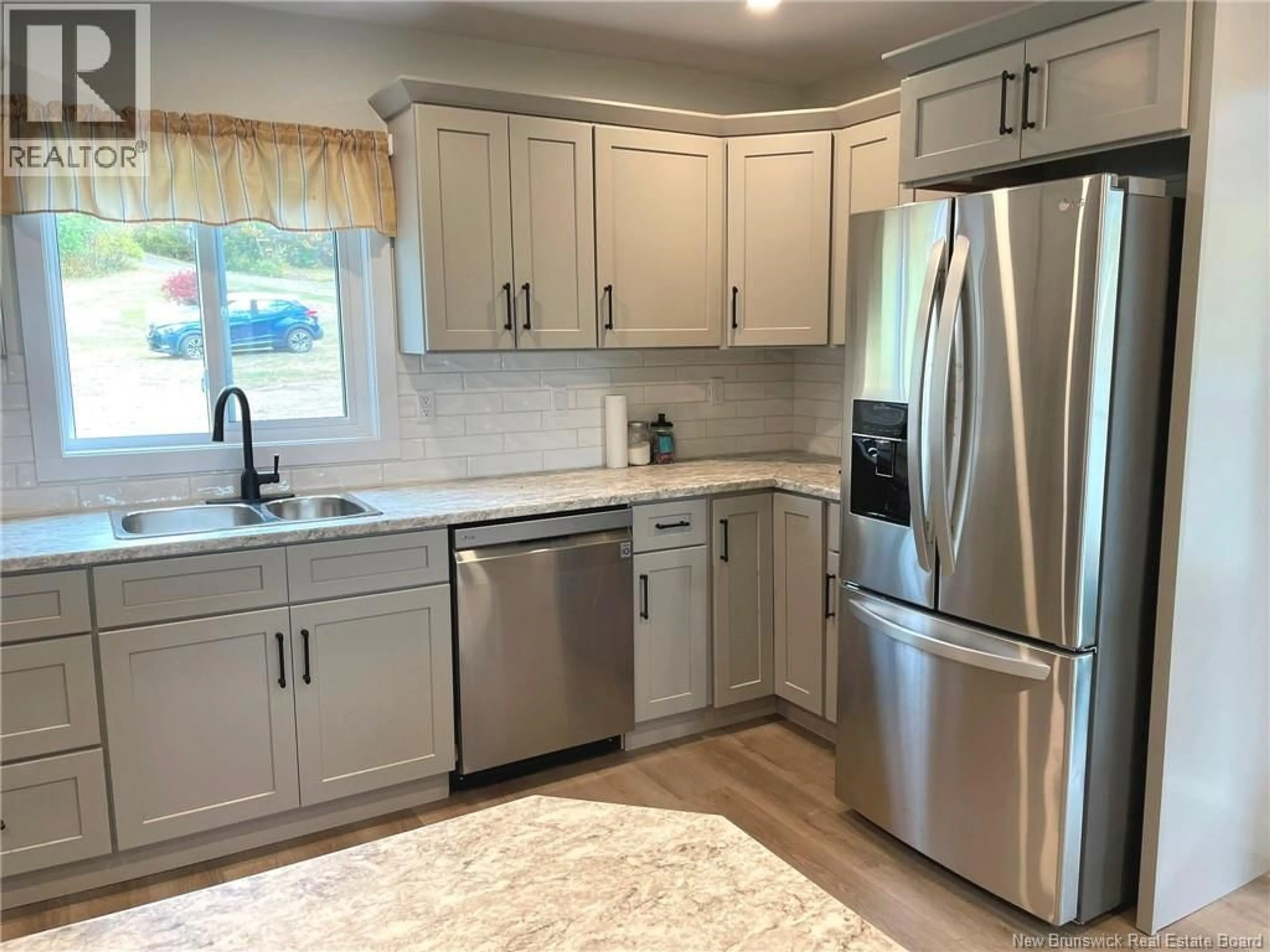 Open concept kitchen, ceramic/tile floor for 10 CAMPBELL LANE, Cambridge-Narrows New Brunswick E4C4S2