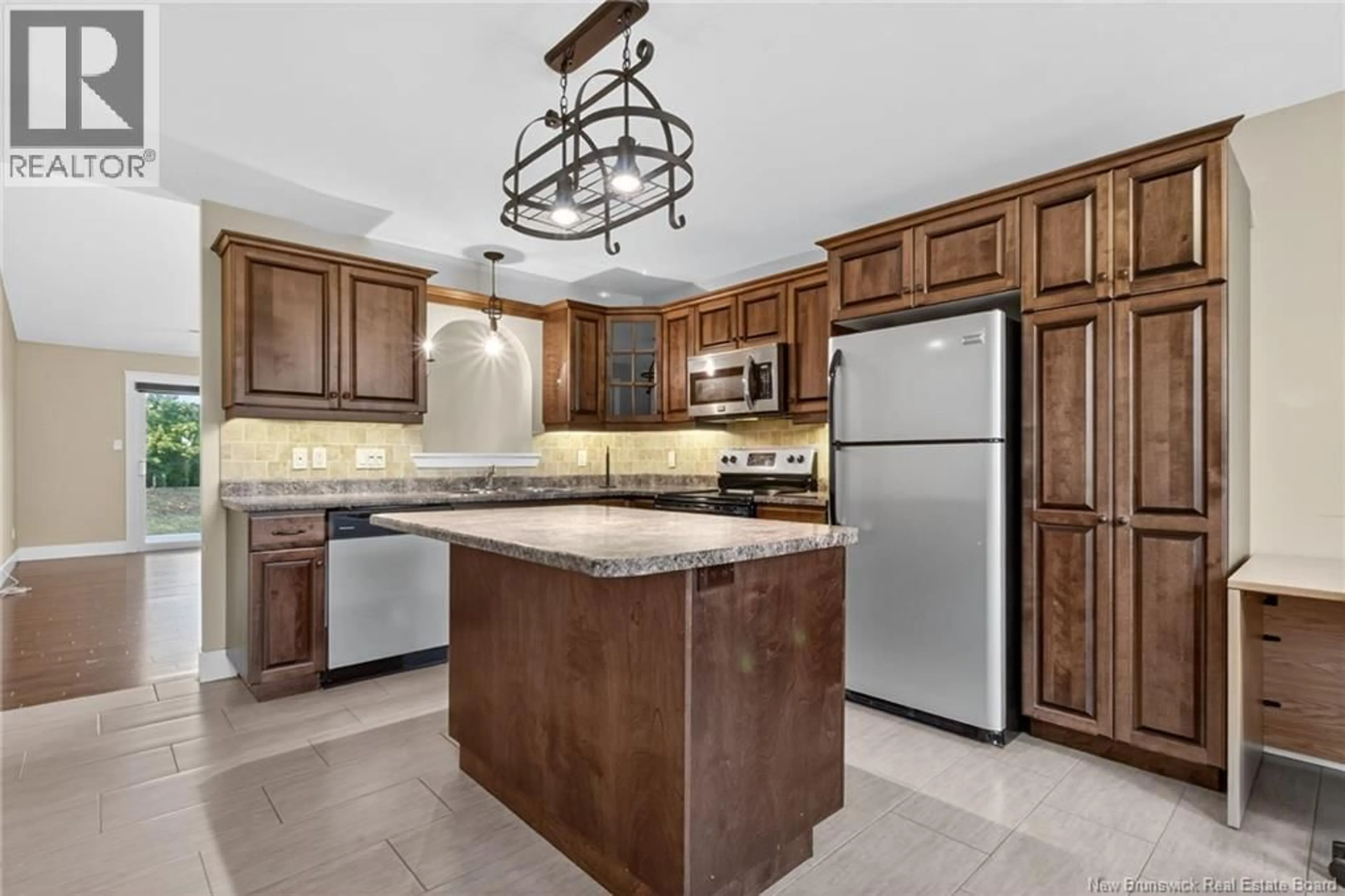 Open concept kitchen, ceramic/tile floor for 32 GOLDEN STREET, Moncton New Brunswick E1G5T4