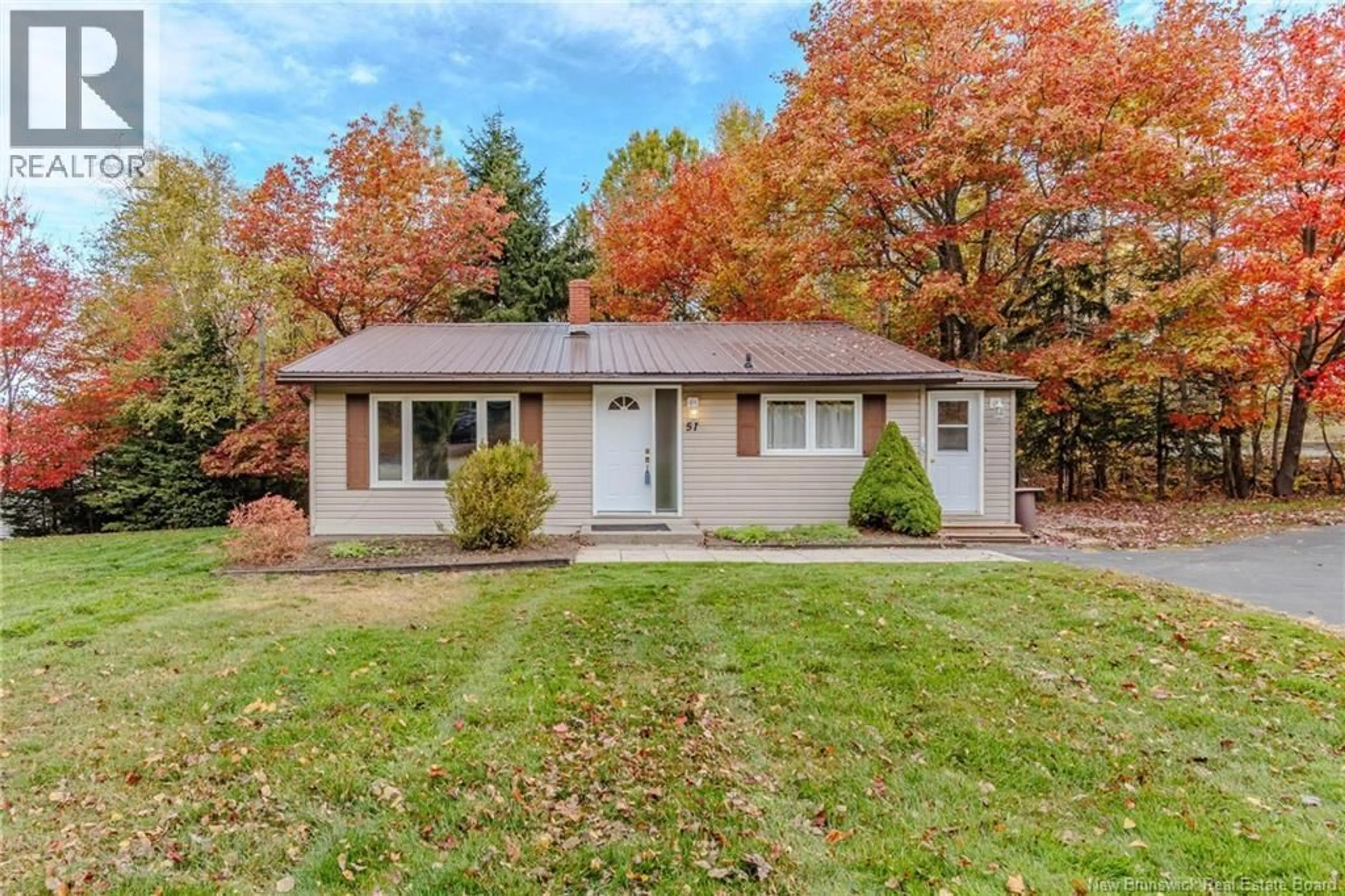 Home with vinyl exterior material, street for 57 IONA AVENUE, Rothesay New Brunswick E2E3J7