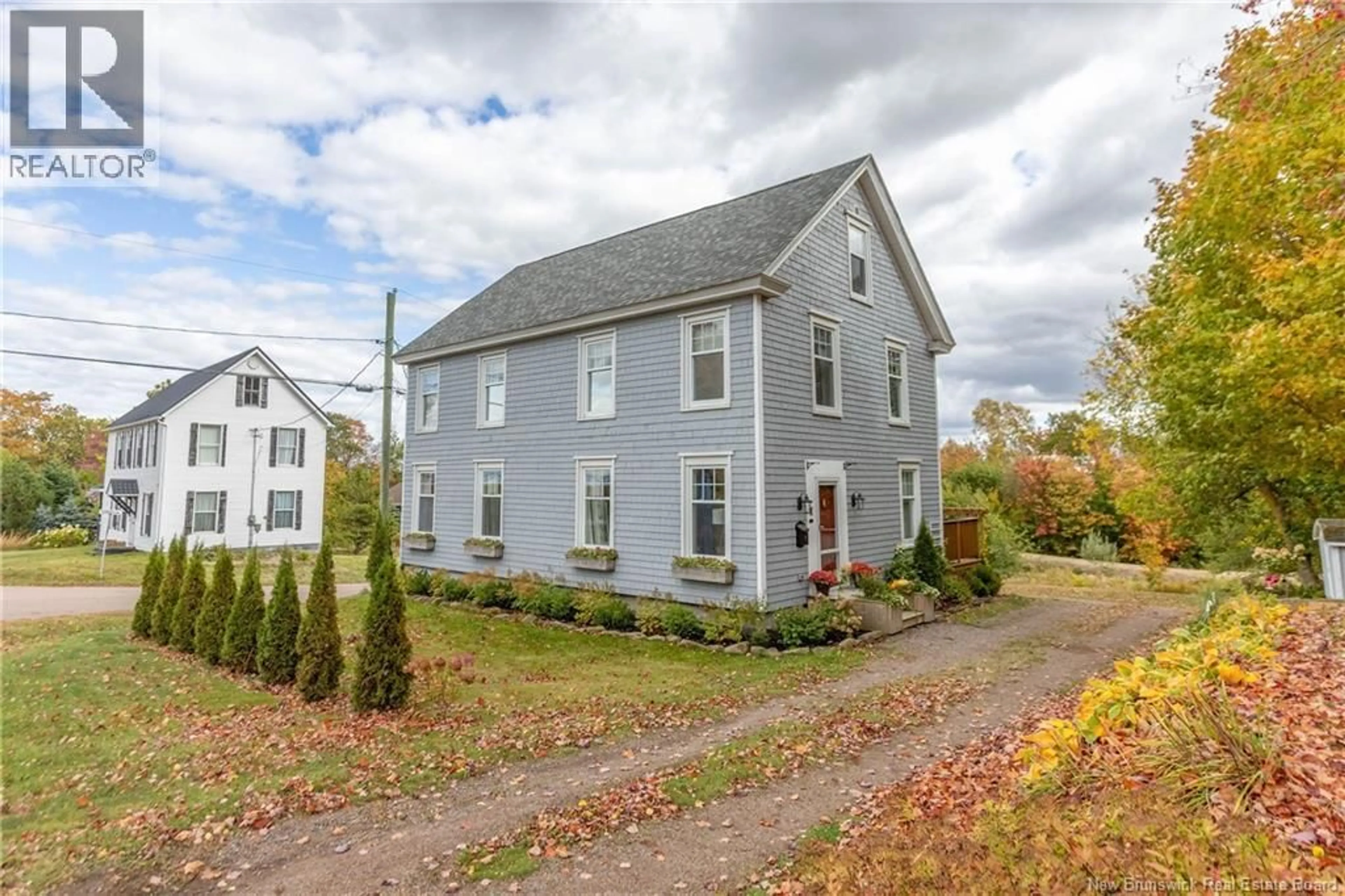 A pic from outside/outdoor area/front of a property/back of a property/a pic from drone, street for 1 SCHOOL LANE, Sackville New Brunswick E4L3J8