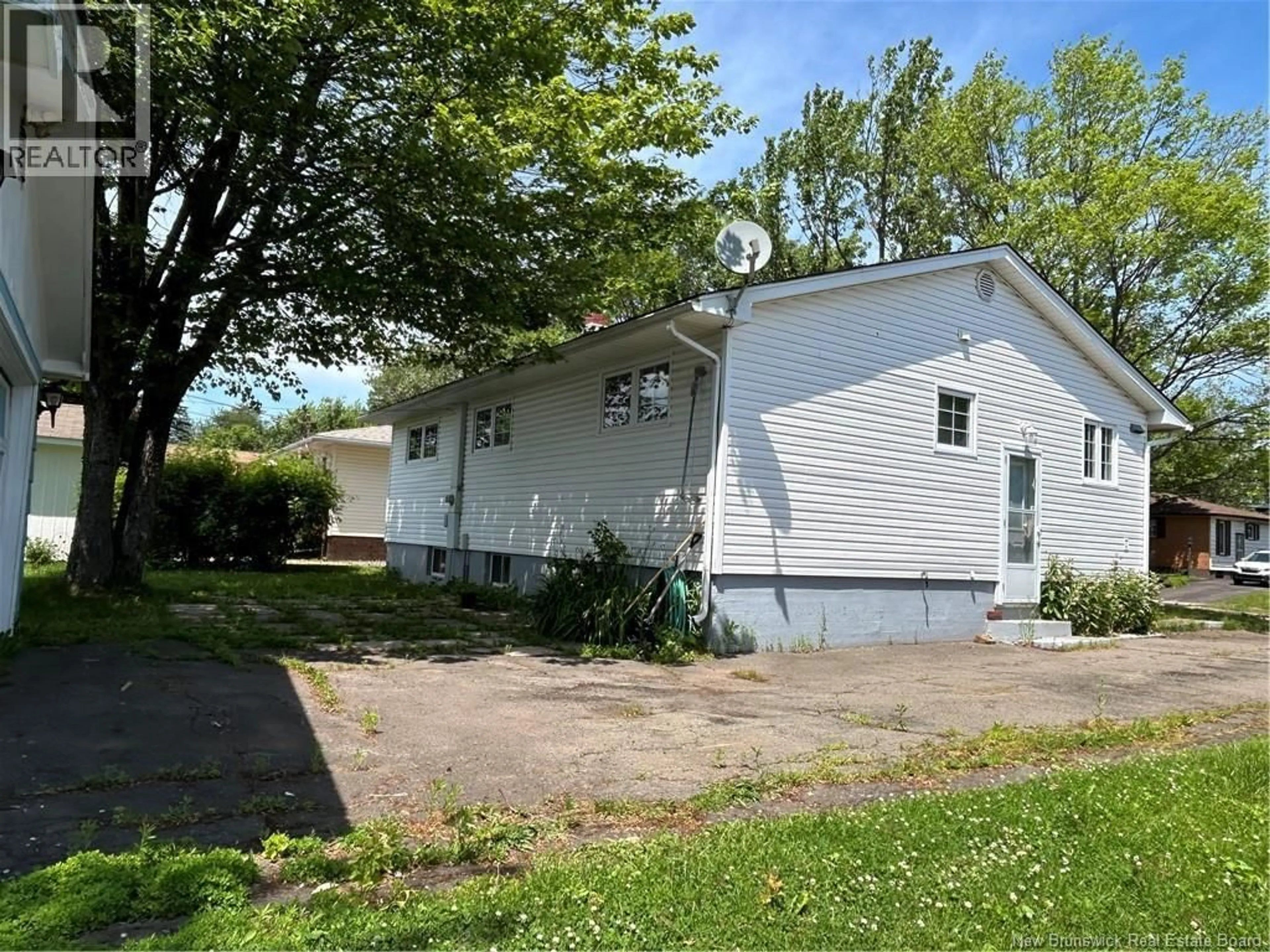 Home with vinyl exterior material, street for 34 SMITH STREET, Moncton New Brunswick E1C8G2