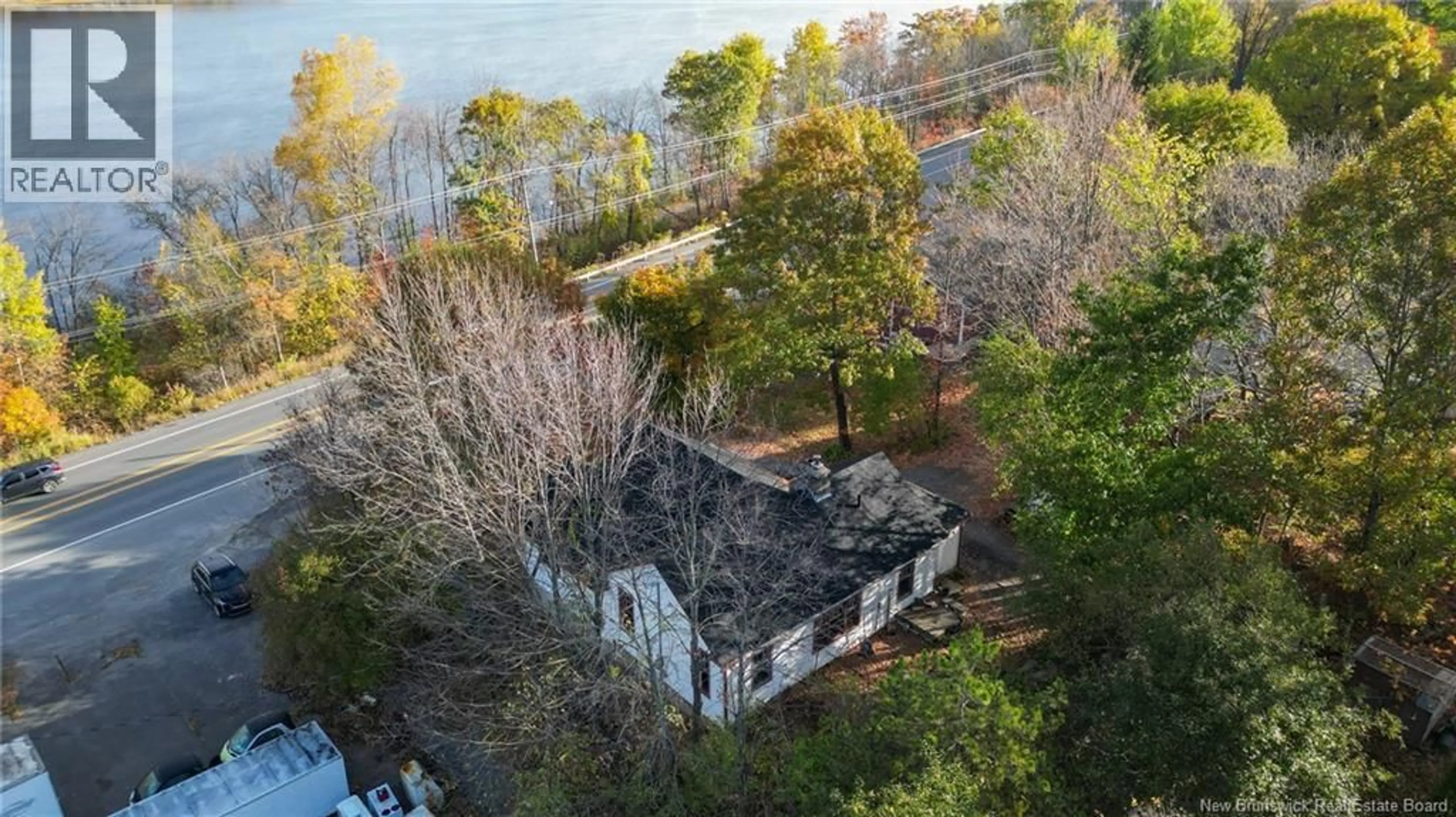 A pic from outside/outdoor area/front of a property/back of a property/a pic from drone, water/lake/river/ocean view for 1856 WOODSTOCK ROAD, Fredericton New Brunswick E3C1L4