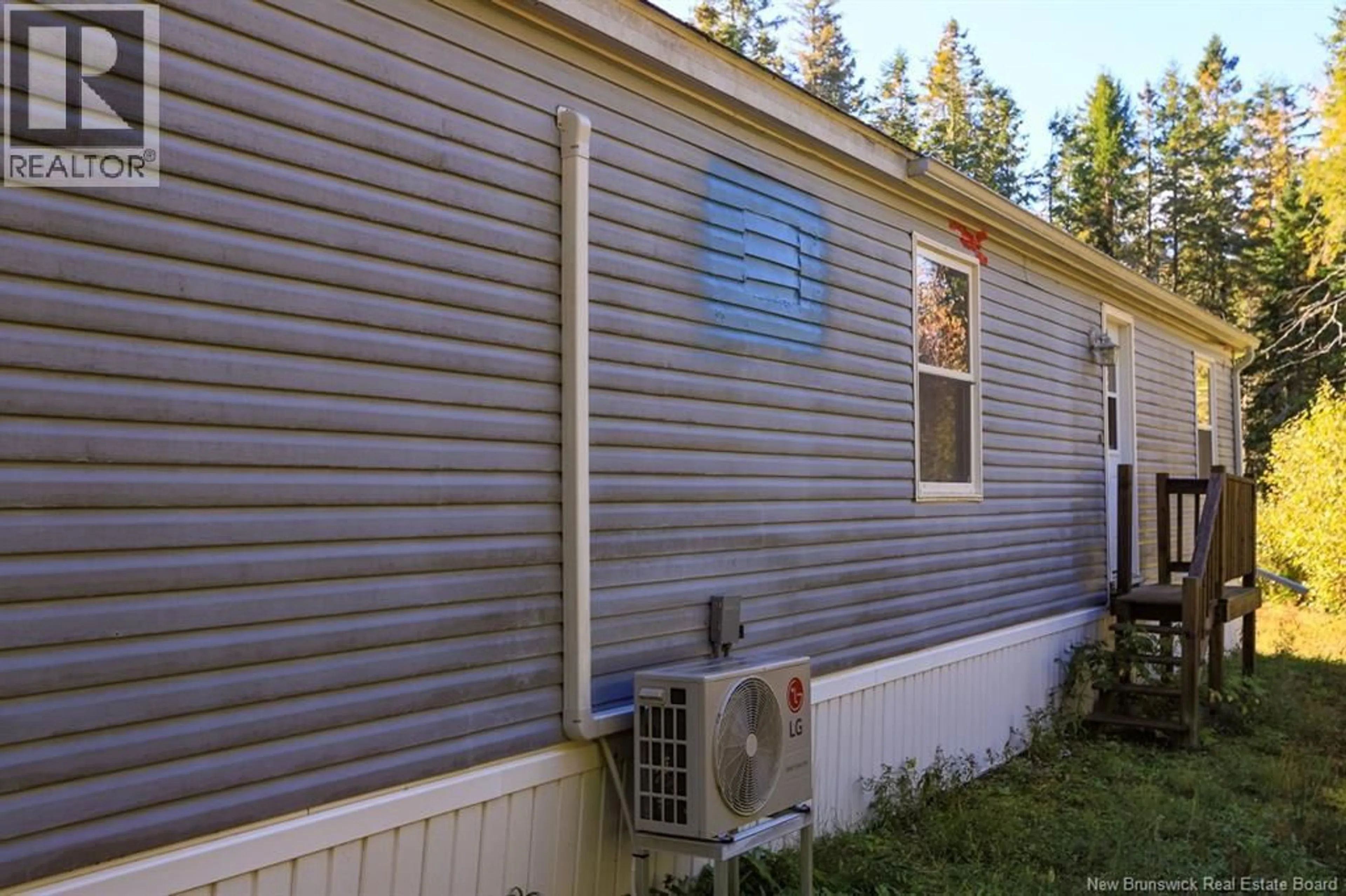 Home with vinyl exterior material, street for 17 SHEPS LANE, Salt Springs New Brunswick E5N4K3