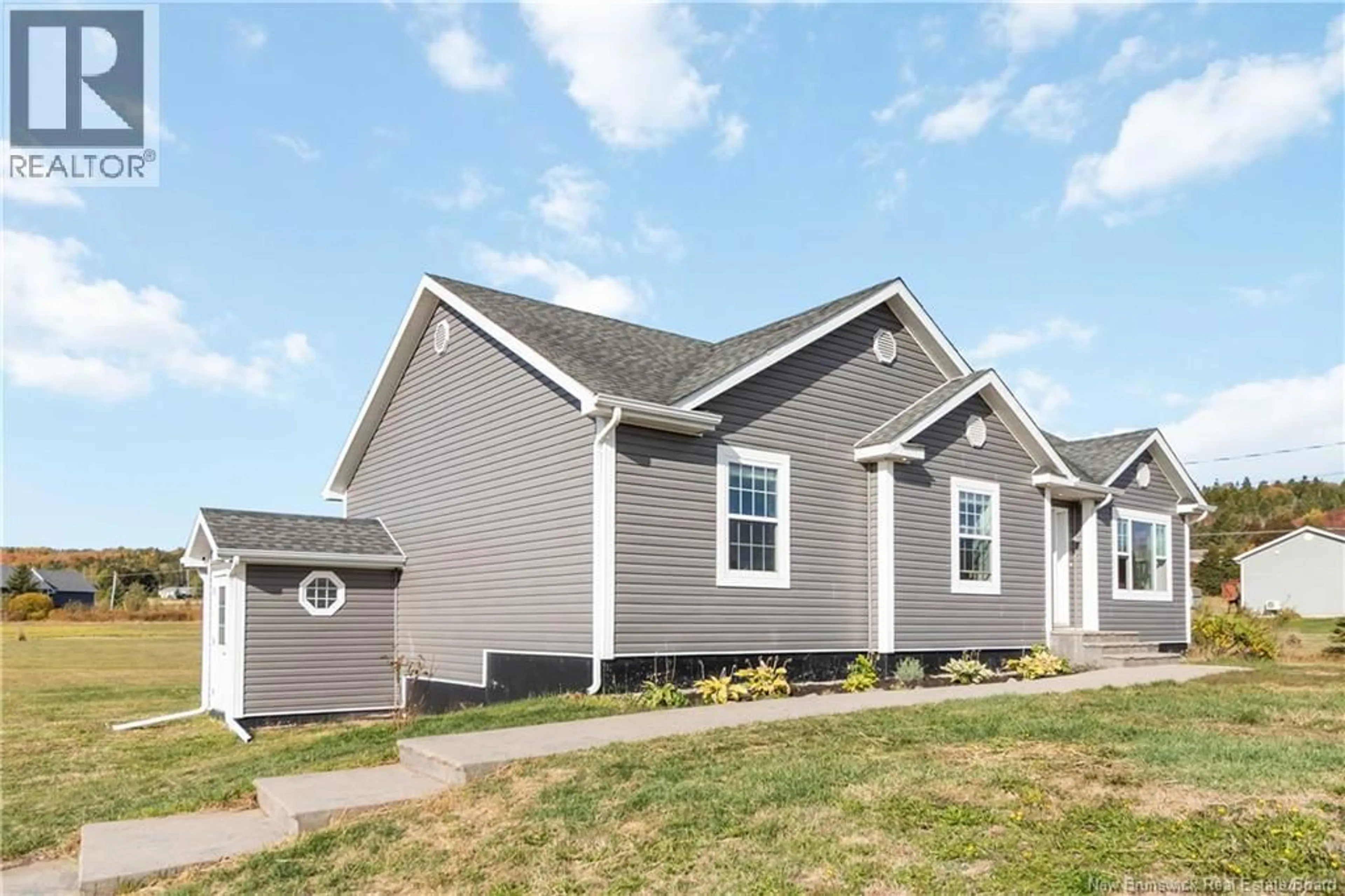 Home with vinyl exterior material, street for 2282 490 ROUTE, Ammon New Brunswick E1G3P4