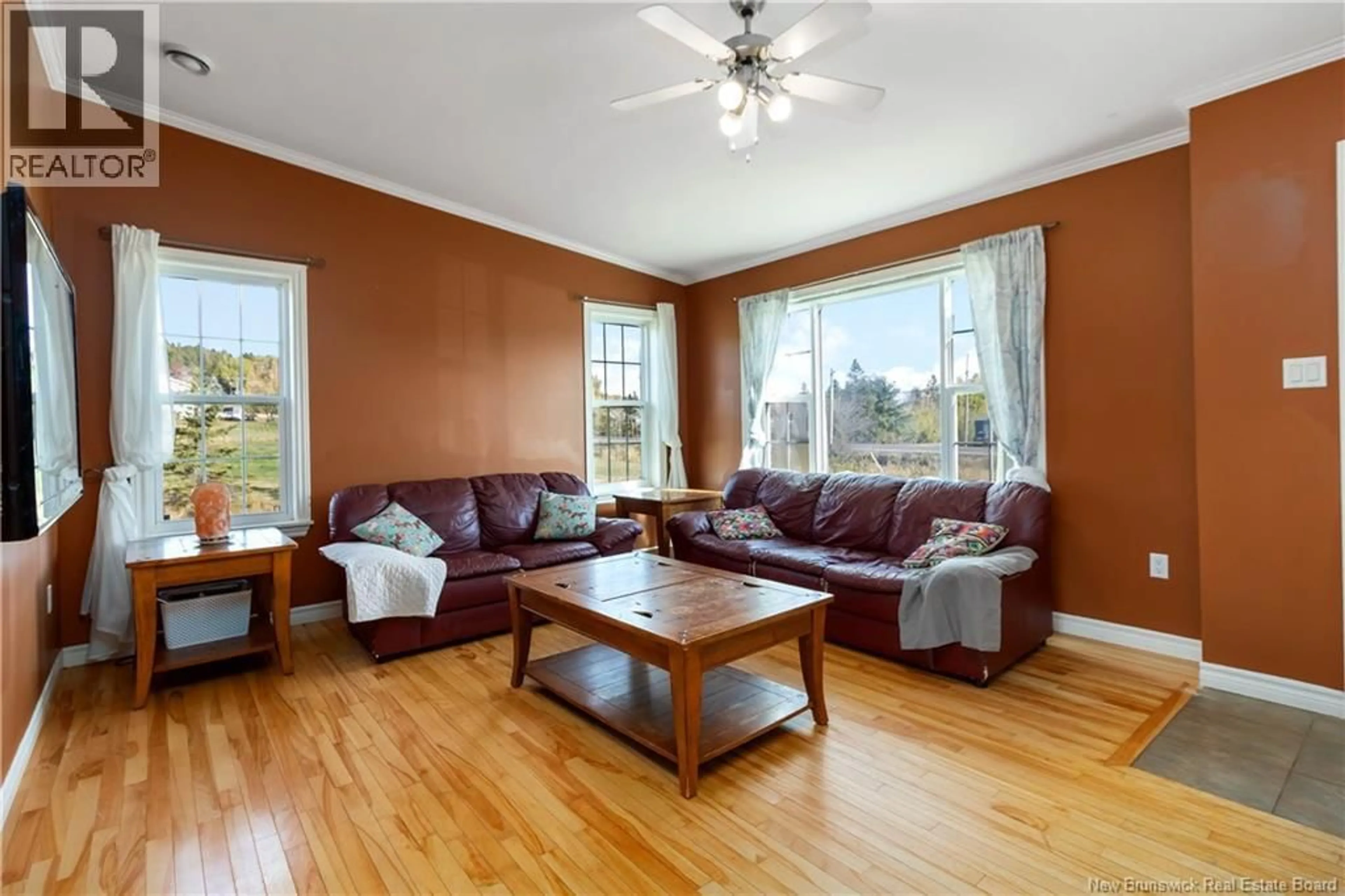 Living room with furniture, wood/laminate floor for 2282 490 ROUTE, Ammon New Brunswick E1G3P4