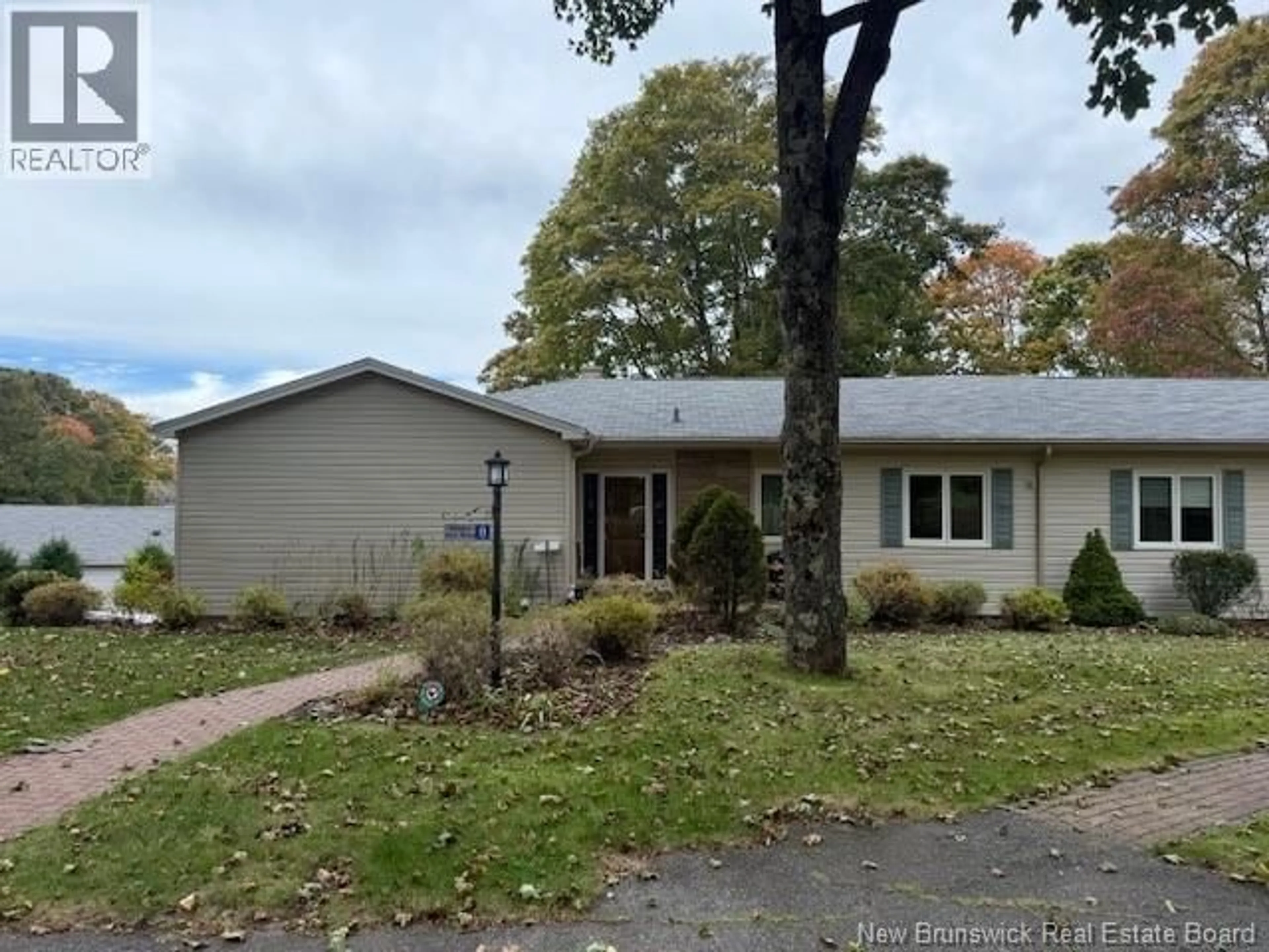 A pic from outside/outdoor area/front of a property/back of a property/a pic from drone, street for 8 TROOP STREET, Rothesay New Brunswick E2E0P2