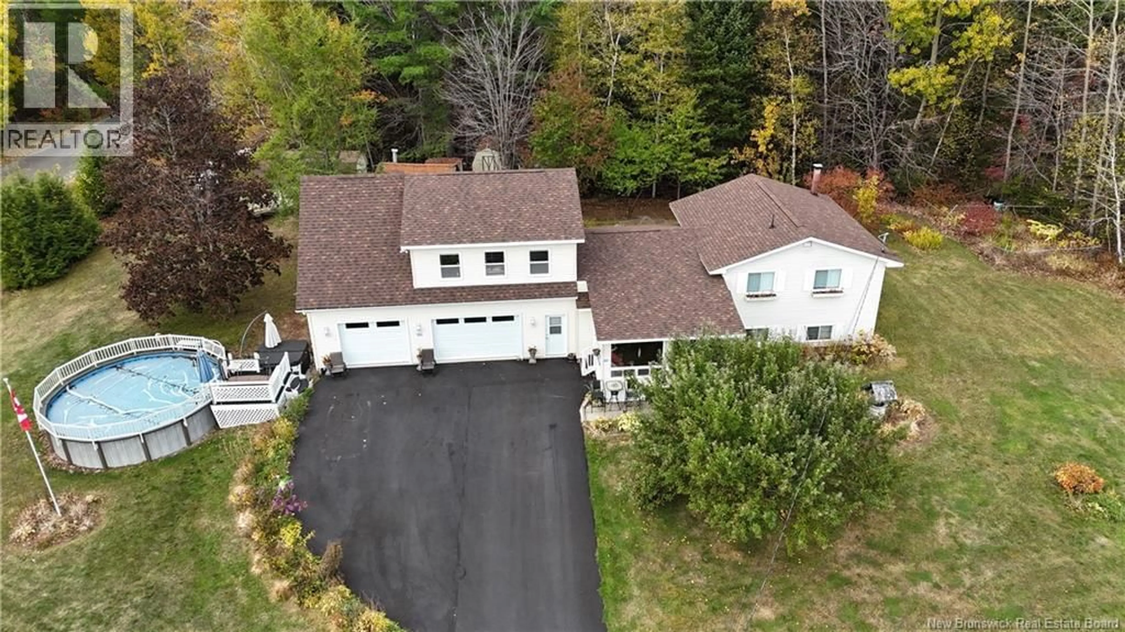 A pic from outside/outdoor area/front of a property/back of a property/a pic from drone, street for 48 MICHAEL AVENUE, Hanwell New Brunswick E3C2A2
