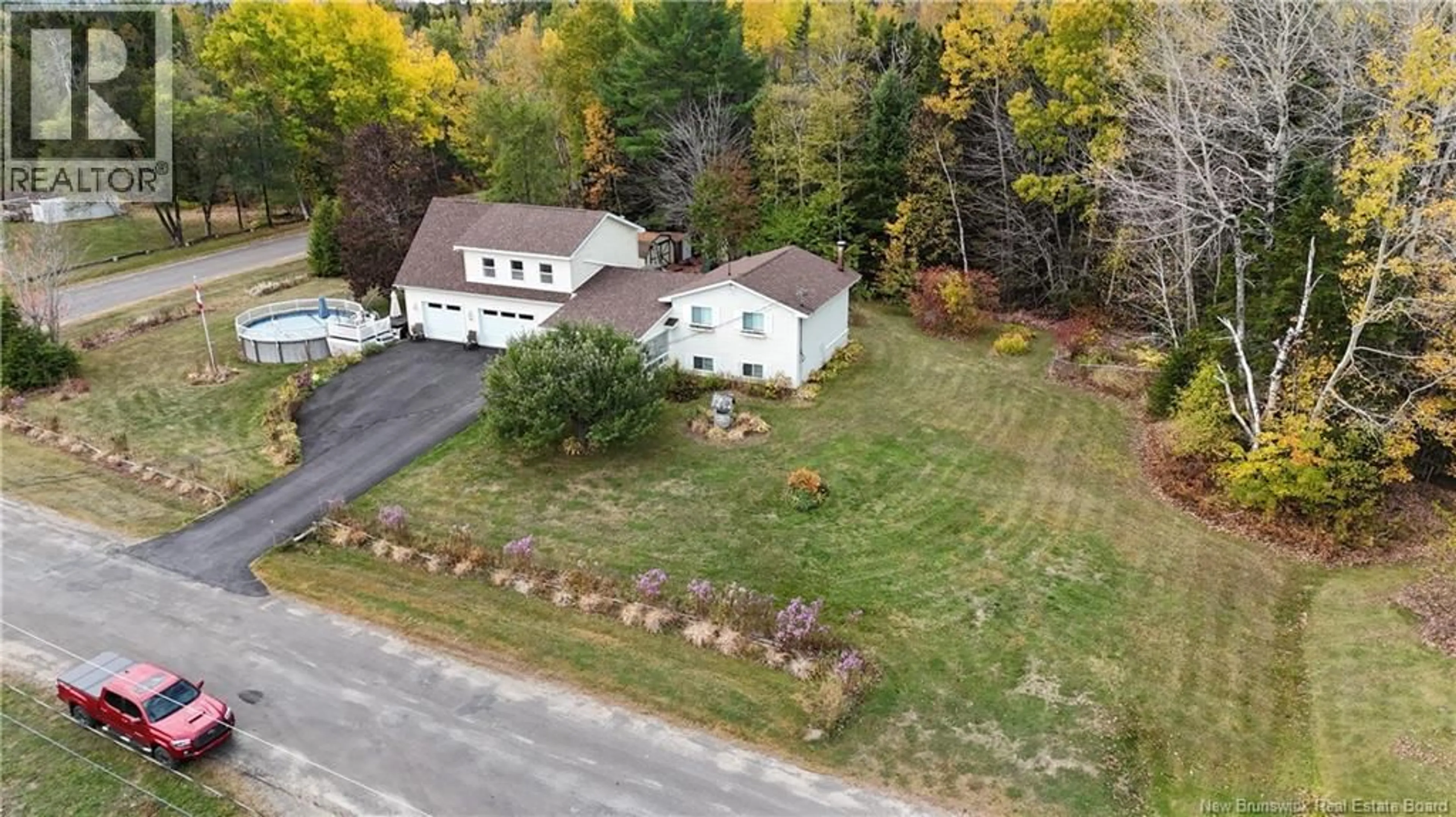 A pic from outside/outdoor area/front of a property/back of a property/a pic from drone, street for 48 MICHAEL AVENUE, Hanwell New Brunswick E3C2A2