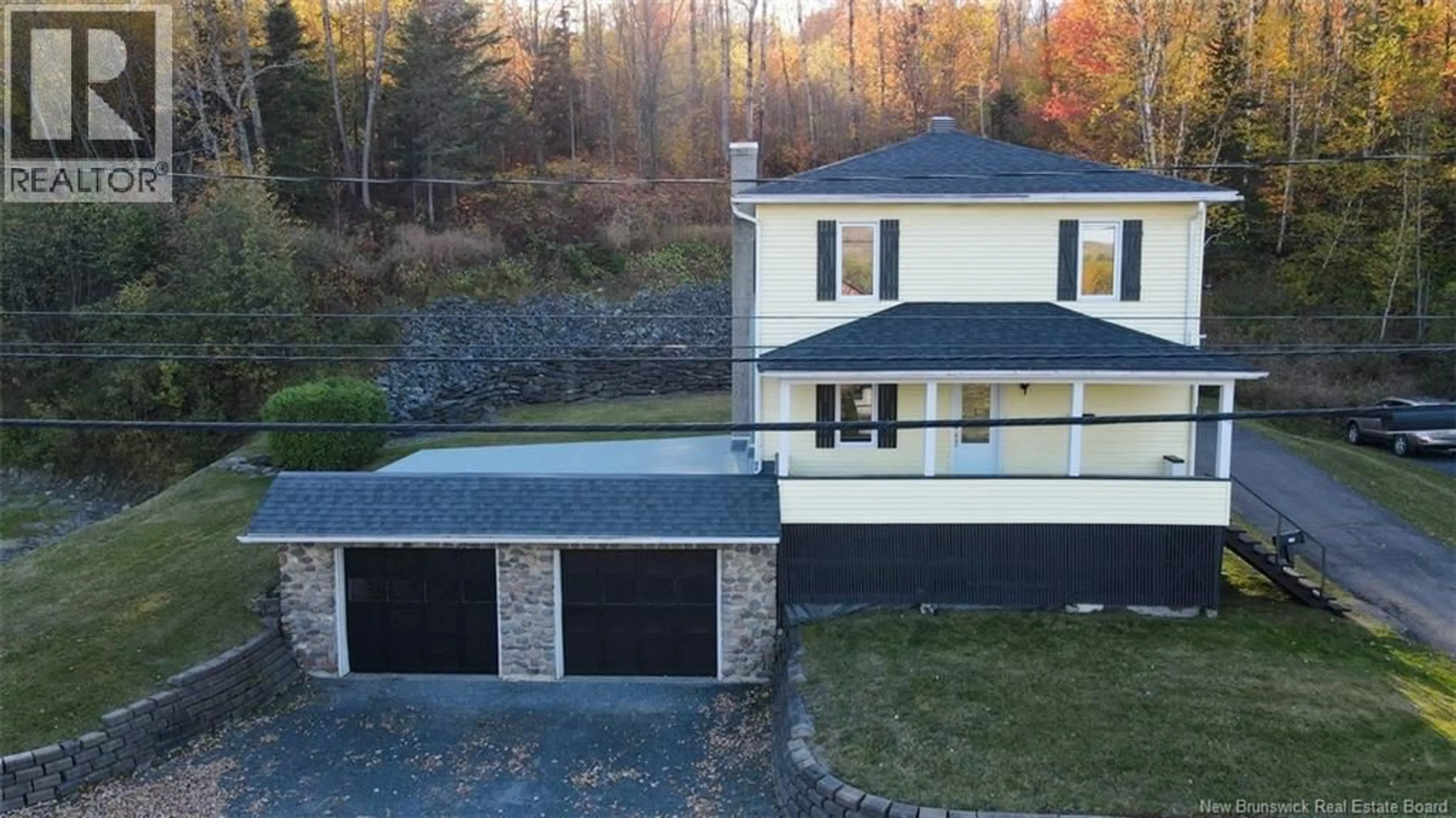 A pic from outside/outdoor area/front of a property/back of a property/a pic from drone, unknown for 584 CANADA ROAD, Edmundston New Brunswick E3V1W4