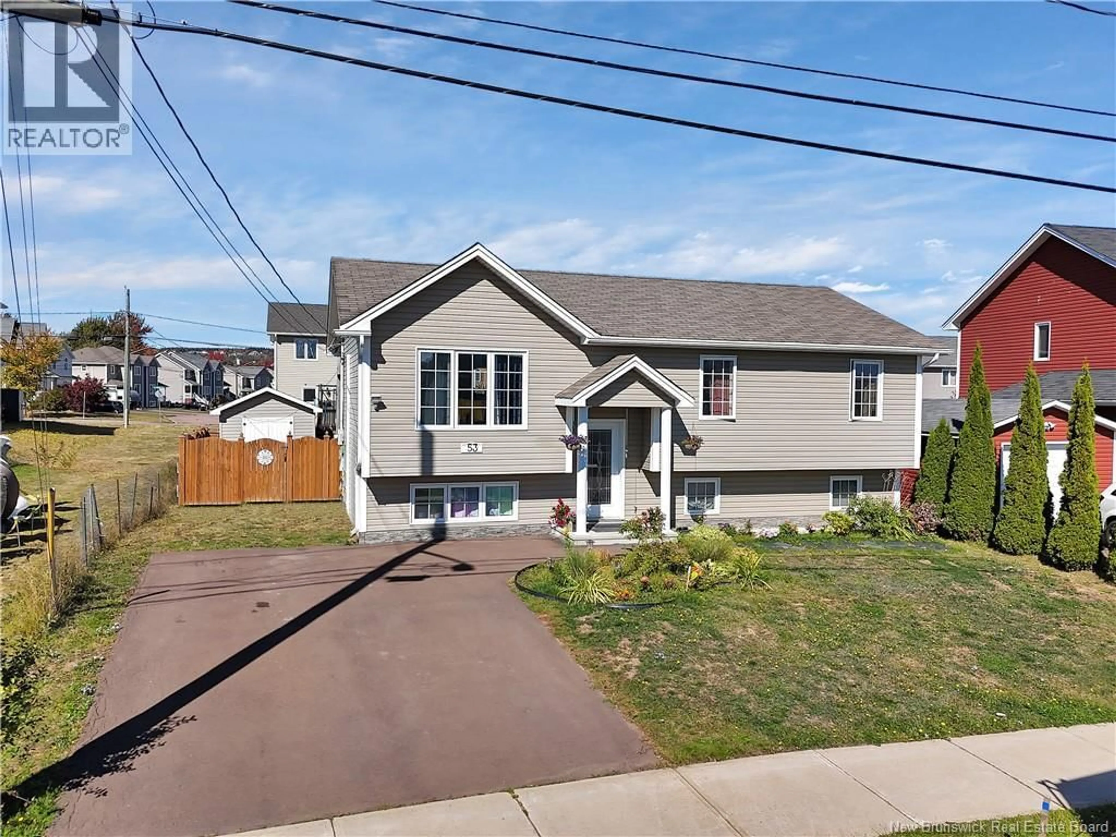 Home with vinyl exterior material, street for 53 FALCON DRIVE, Moncton New Brunswick E1G0H8