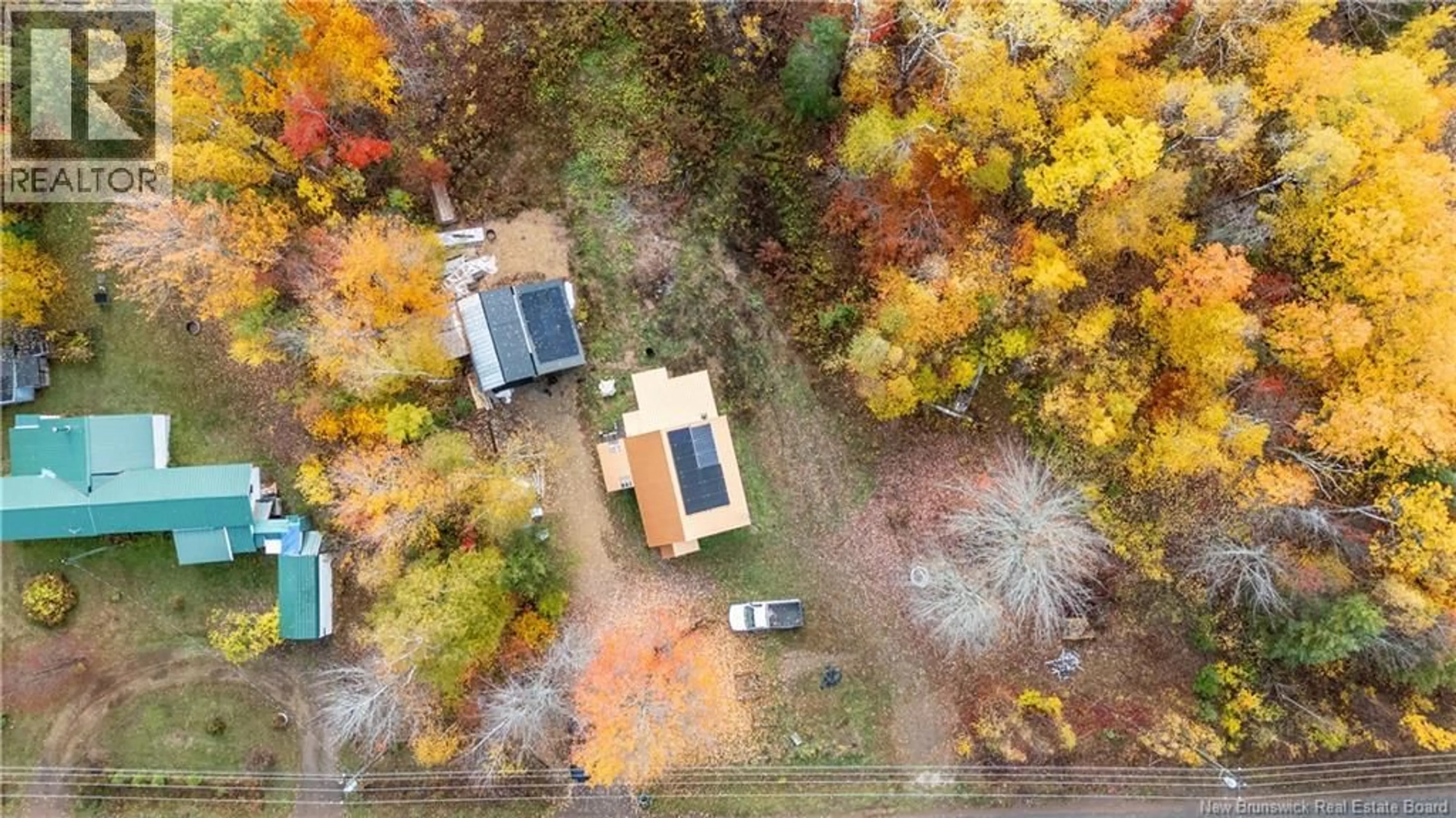 A pic from outside/outdoor area/front of a property/back of a property/a pic from drone, forest/trees view for 599 DAWSON ROAD, Dawson Settlement New Brunswick E4H2B8