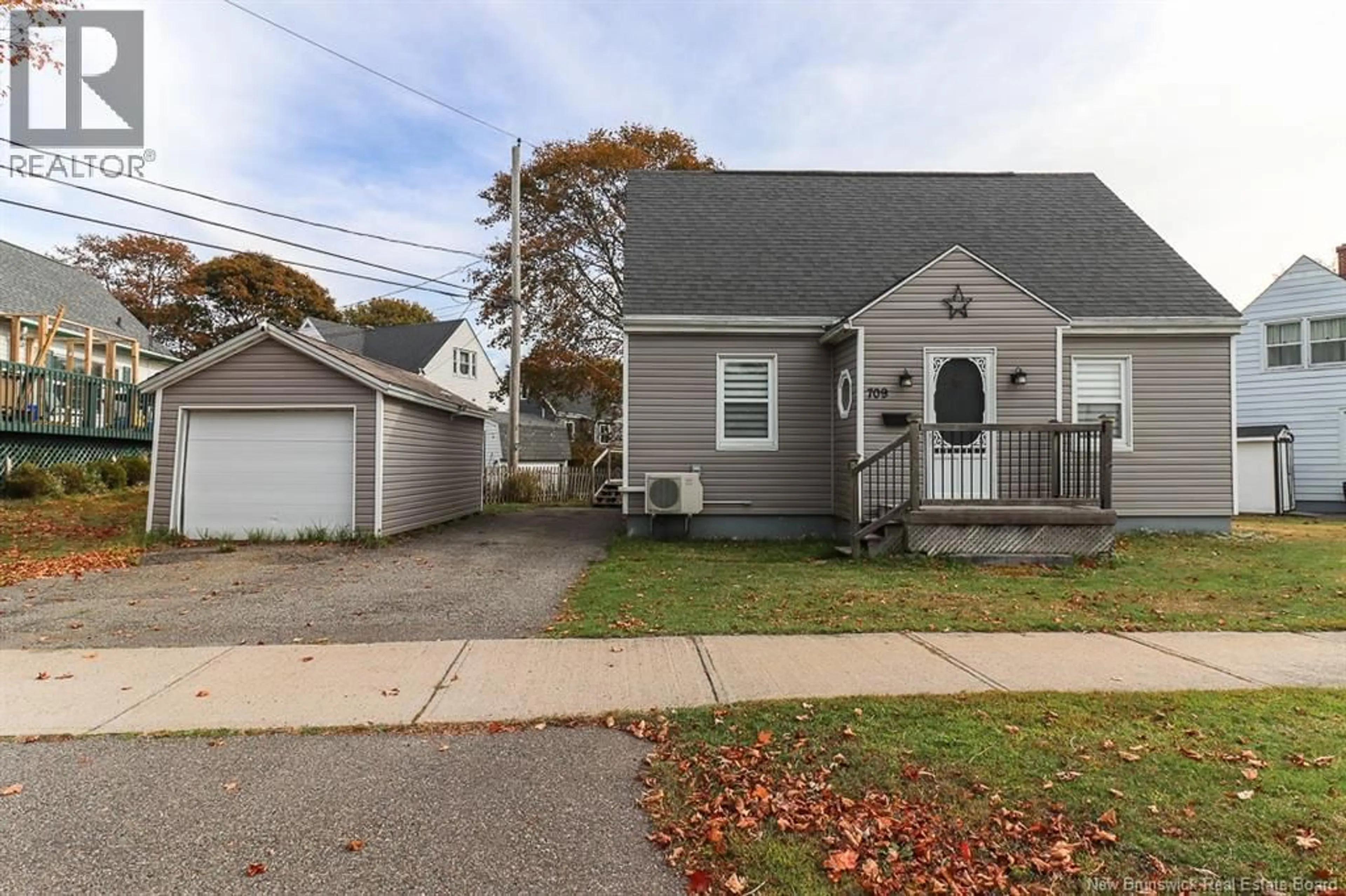 Home with vinyl exterior material, street for 709 SAND COVE ROAD, Saint John New Brunswick E2M3E2