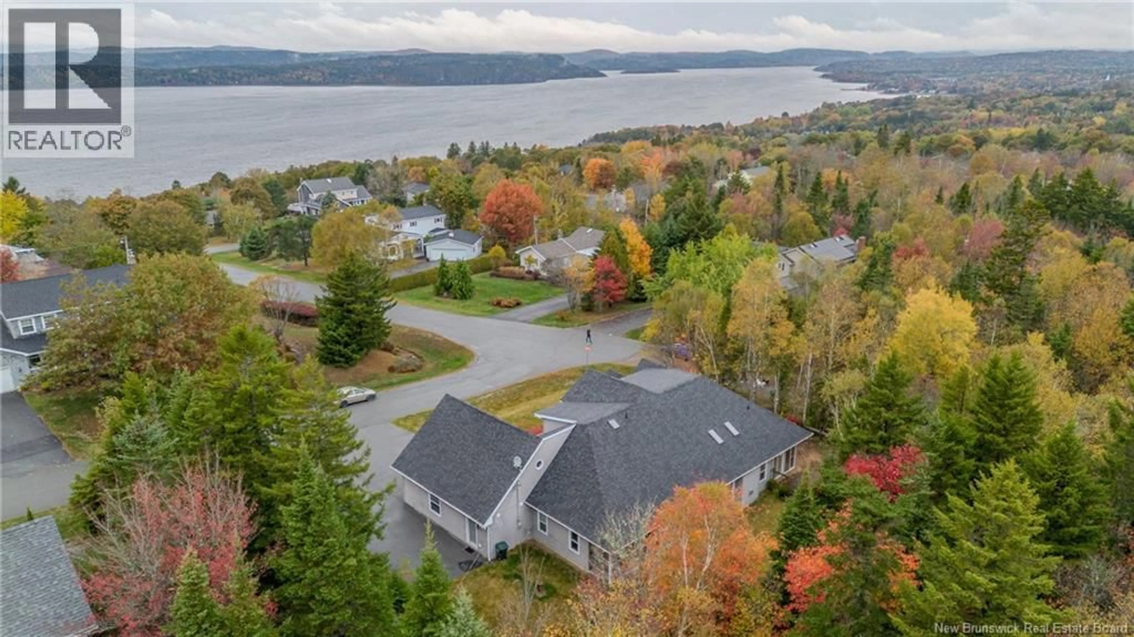 A pic from outside/outdoor area/front of a property/back of a property/a pic from drone, water/lake/river/ocean view for 1 HIGH CLIFF COURT, Rothesay New Brunswick E2H2T8