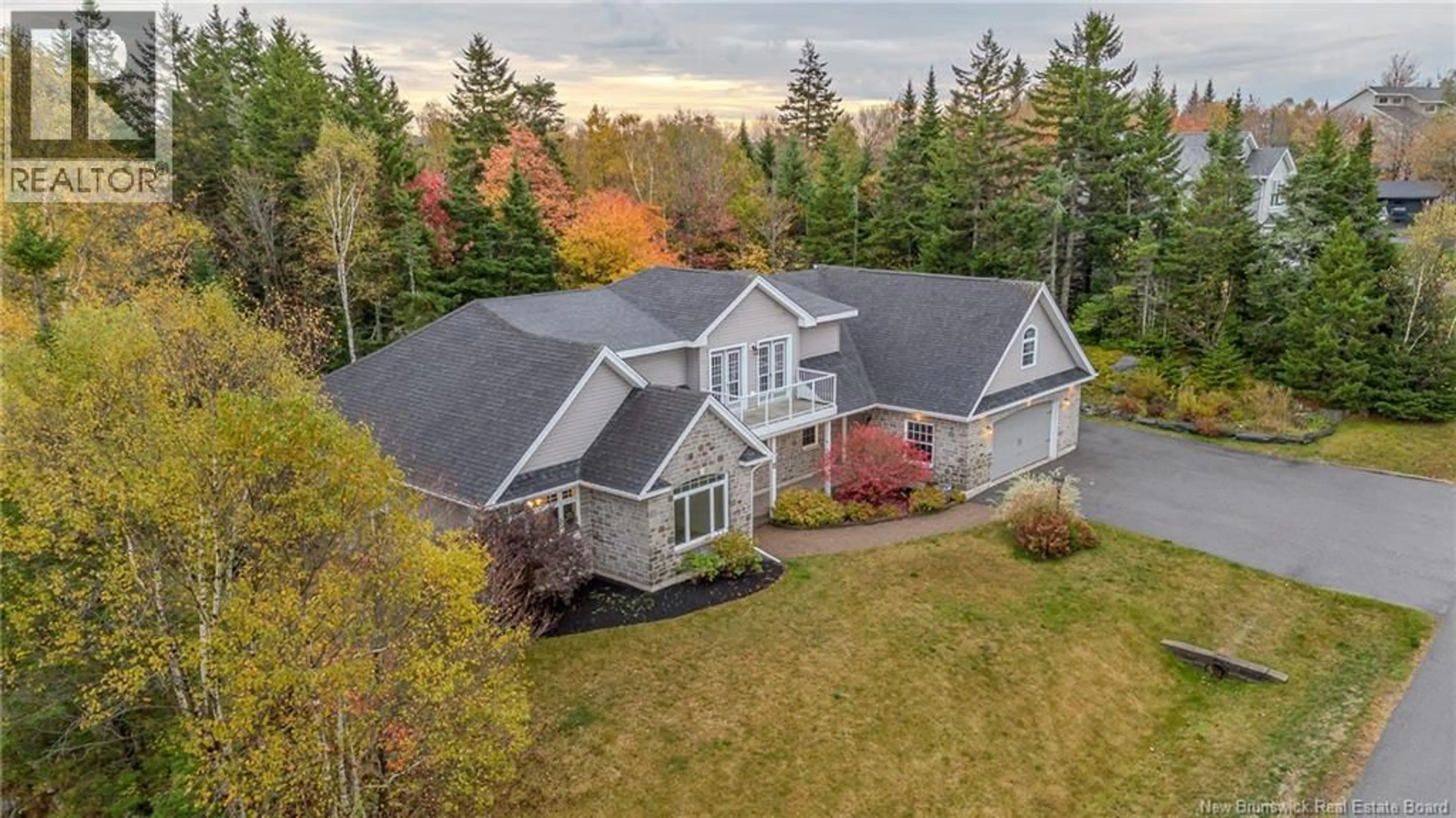 A pic from outside/outdoor area/front of a property/back of a property/a pic from drone, unknown for 1 HIGH CLIFF COURT, Rothesay New Brunswick E2H2T8