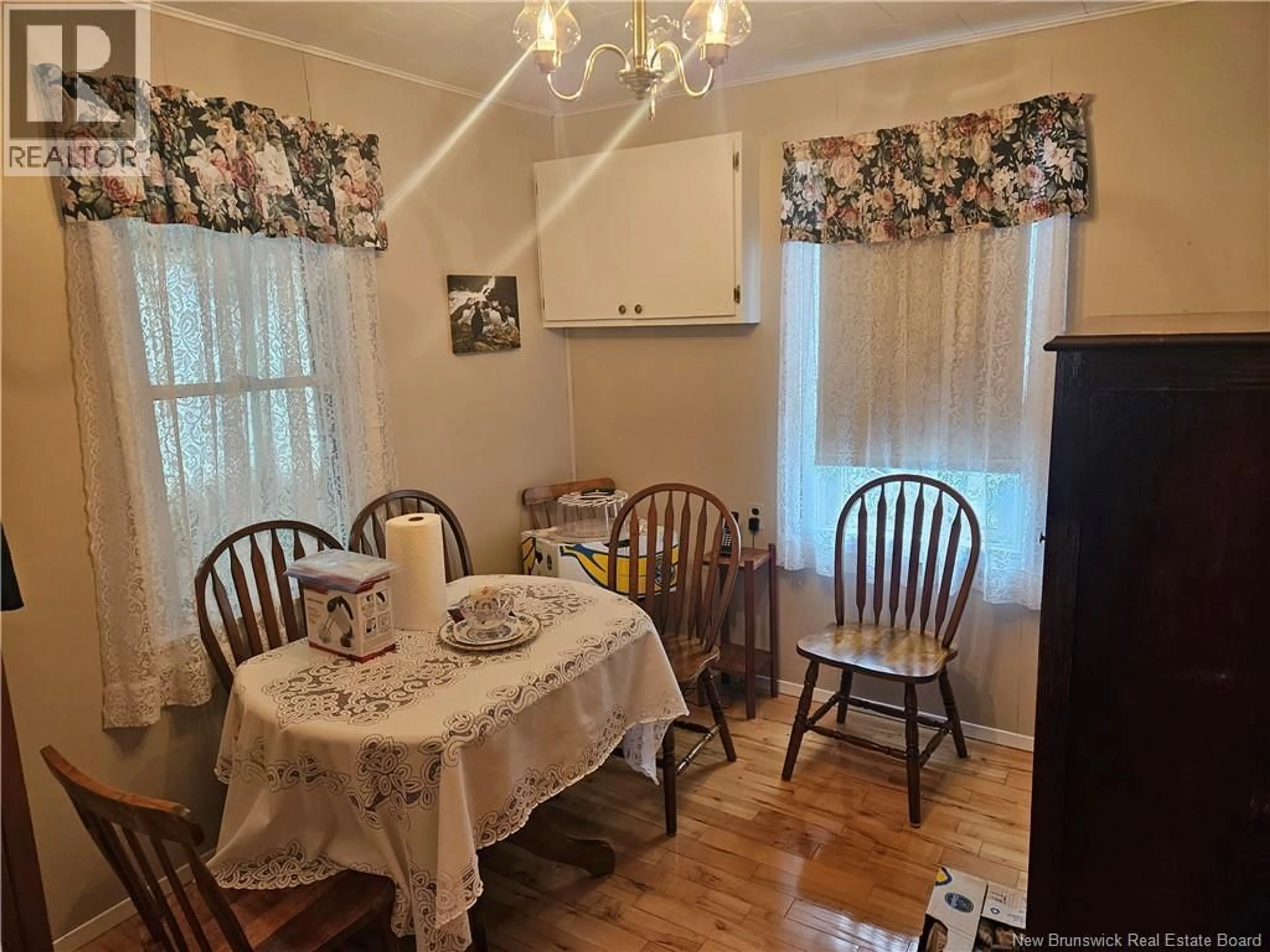 Dining room, wood/laminate floor for 169 MAIN STREET, Blackville New Brunswick E9B1S3