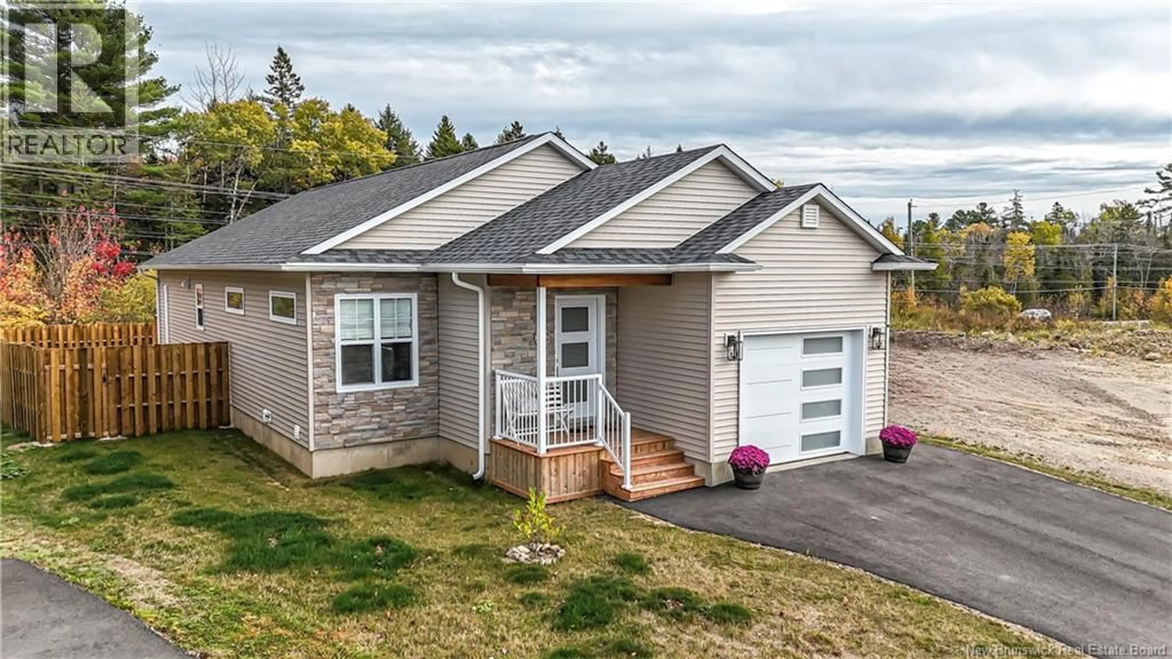 Home with vinyl exterior material, street for 99 BRAMBLE WAY, Fredericton New Brunswick E3G0C8
