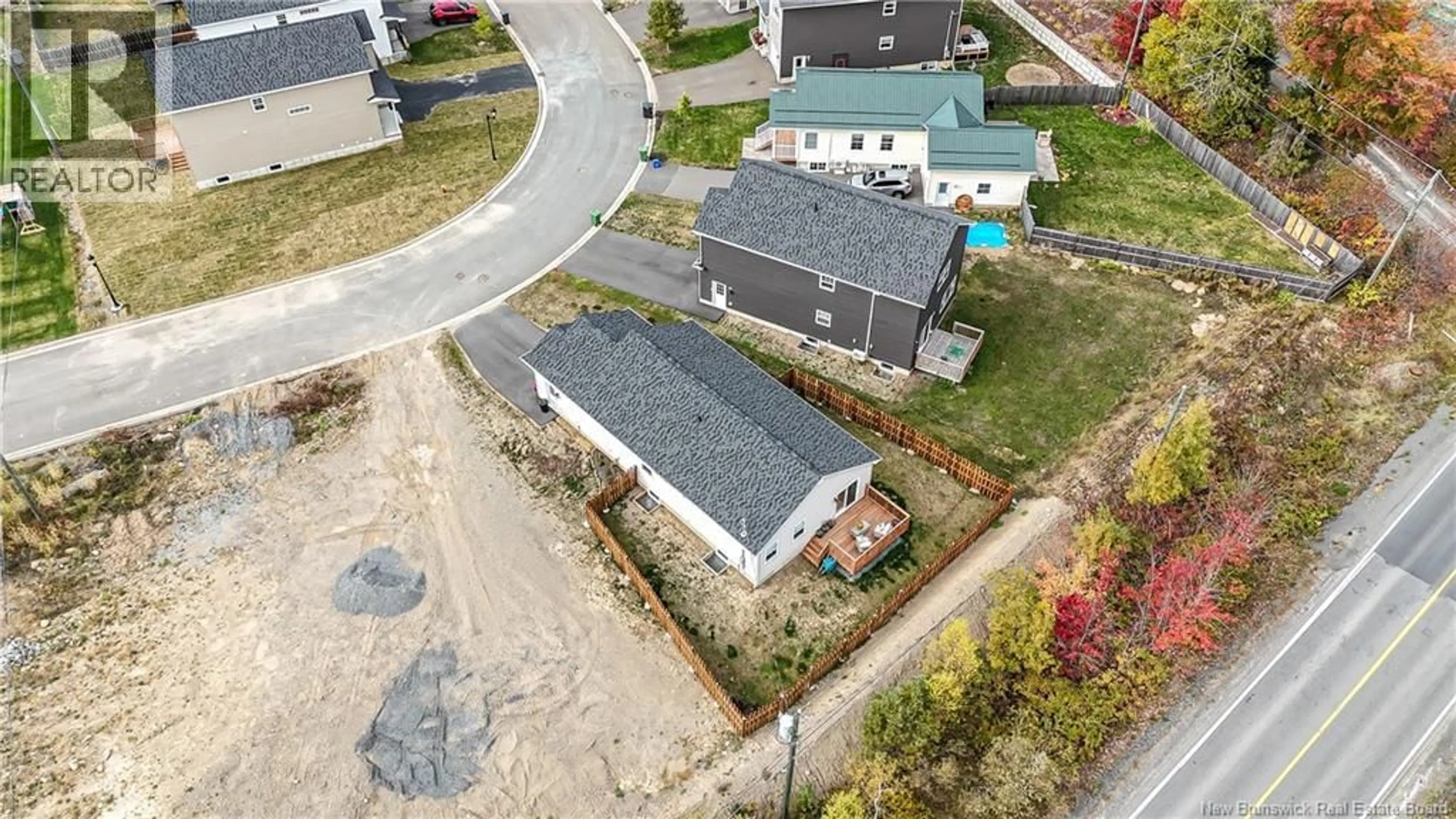 A pic from outside/outdoor area/front of a property/back of a property/a pic from drone, street for 99 BRAMBLE WAY, Fredericton New Brunswick E3G0C8