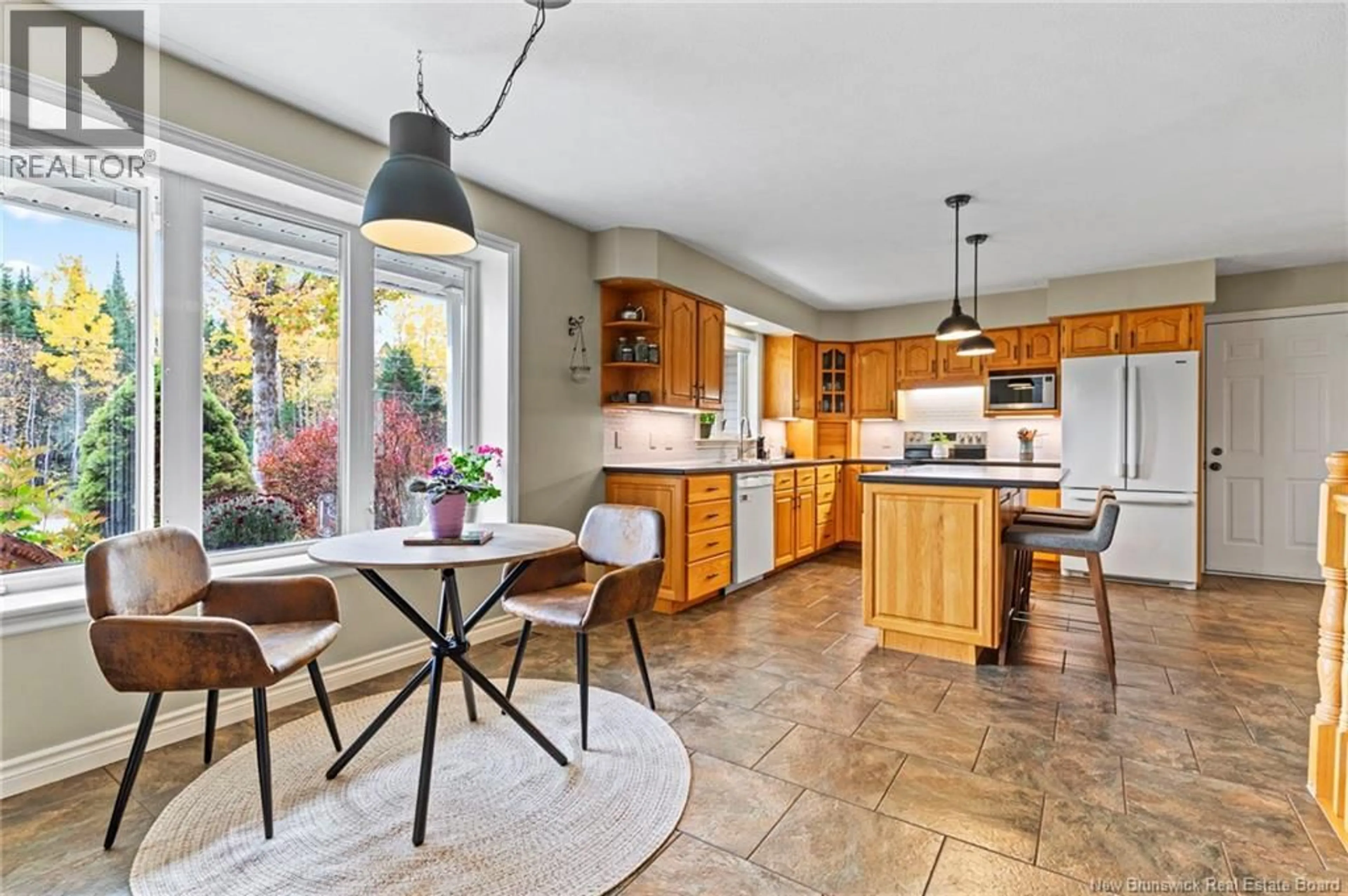 Open concept kitchen, ceramic/tile floor for 45 MARS LANE, Hanwell New Brunswick E3C1M9