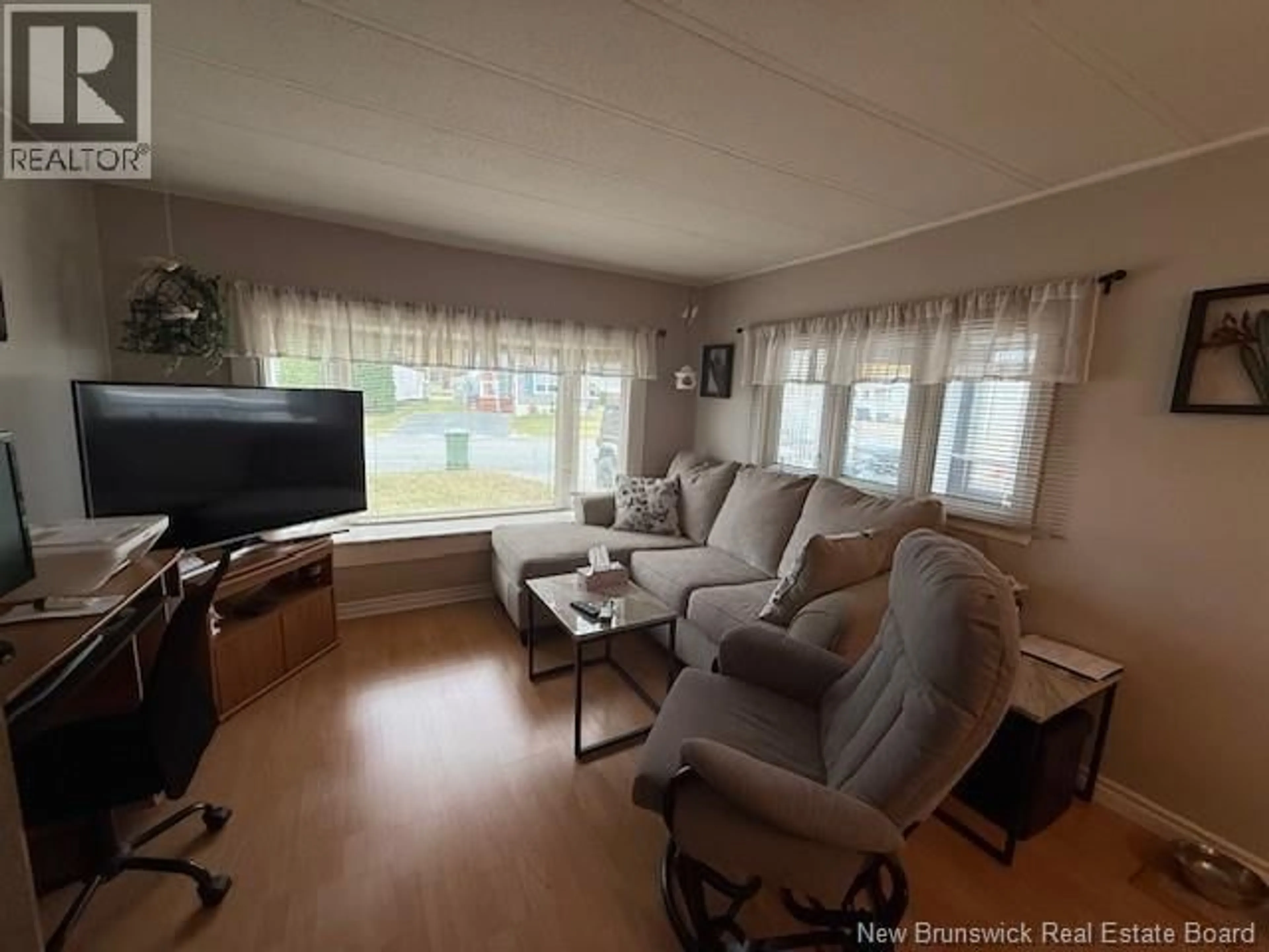 Living room with furniture, unknown for 29 MOUNTAIN VIEW PLACE, Campbellton New Brunswick E3N3K8