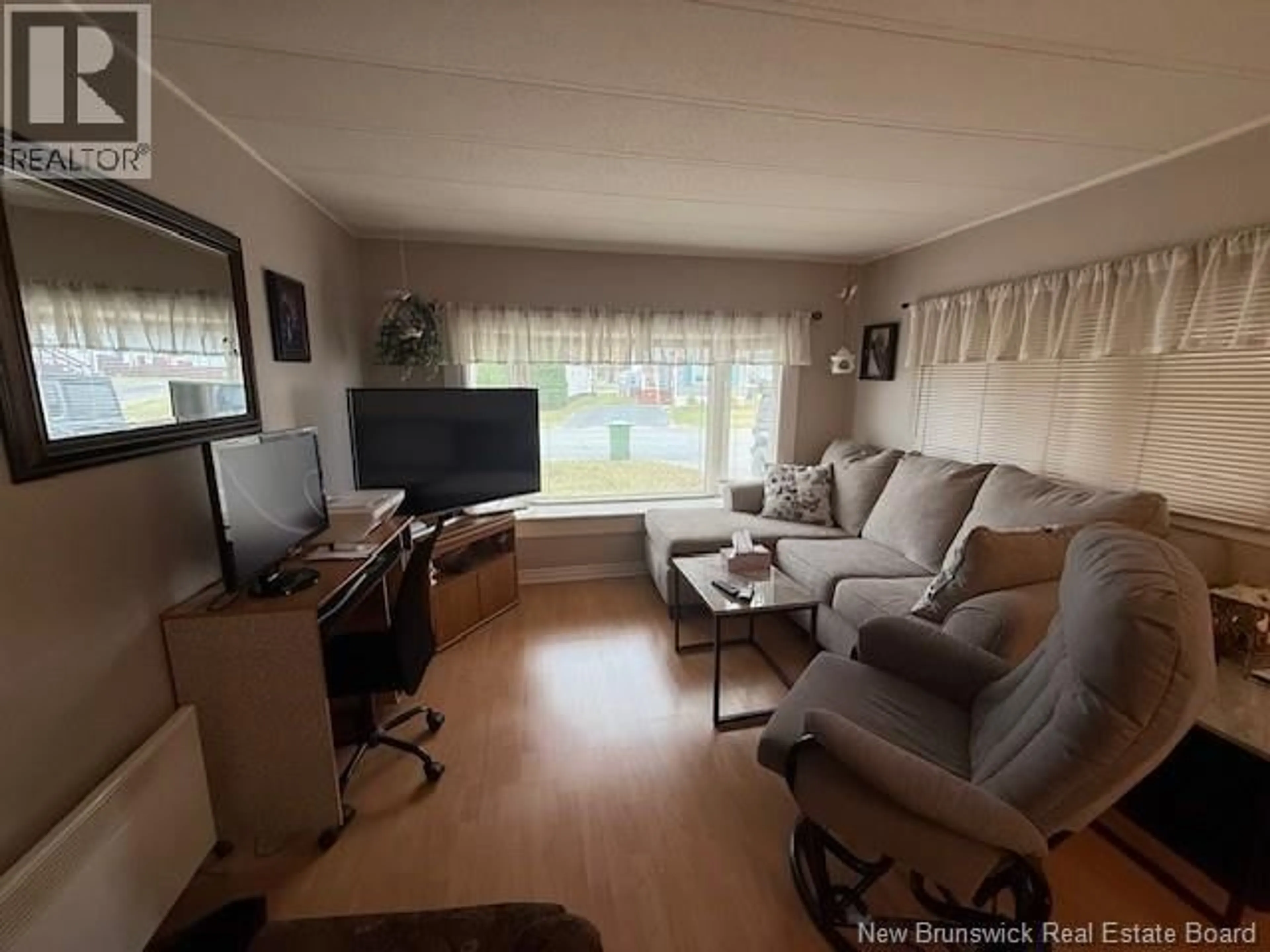 Living room with furniture, unknown for 29 MOUNTAIN VIEW PLACE, Campbellton New Brunswick E3N3K8