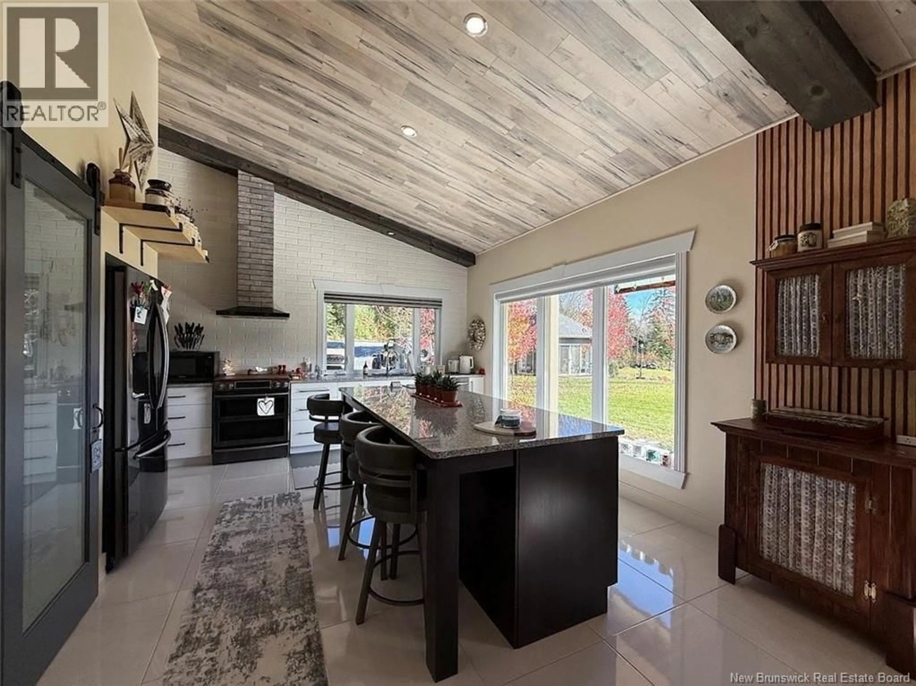 Open concept kitchen, ceramic/tile floor for 134 TITUS ROAD, Edmundston New Brunswick E3V5B5