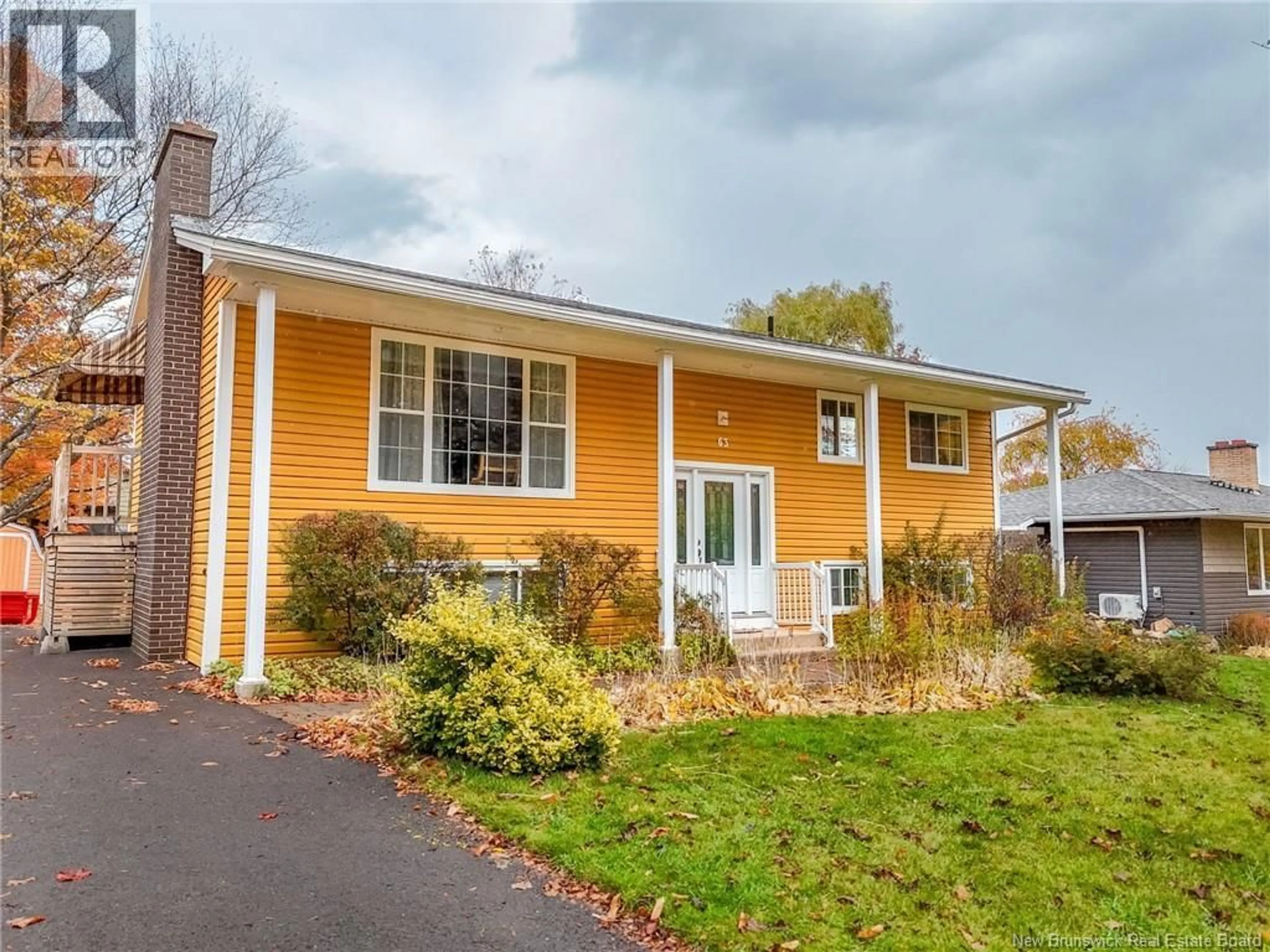 Home with vinyl exterior material, street for 63 FOLEY COURT, Fredericton New Brunswick E3B2R8