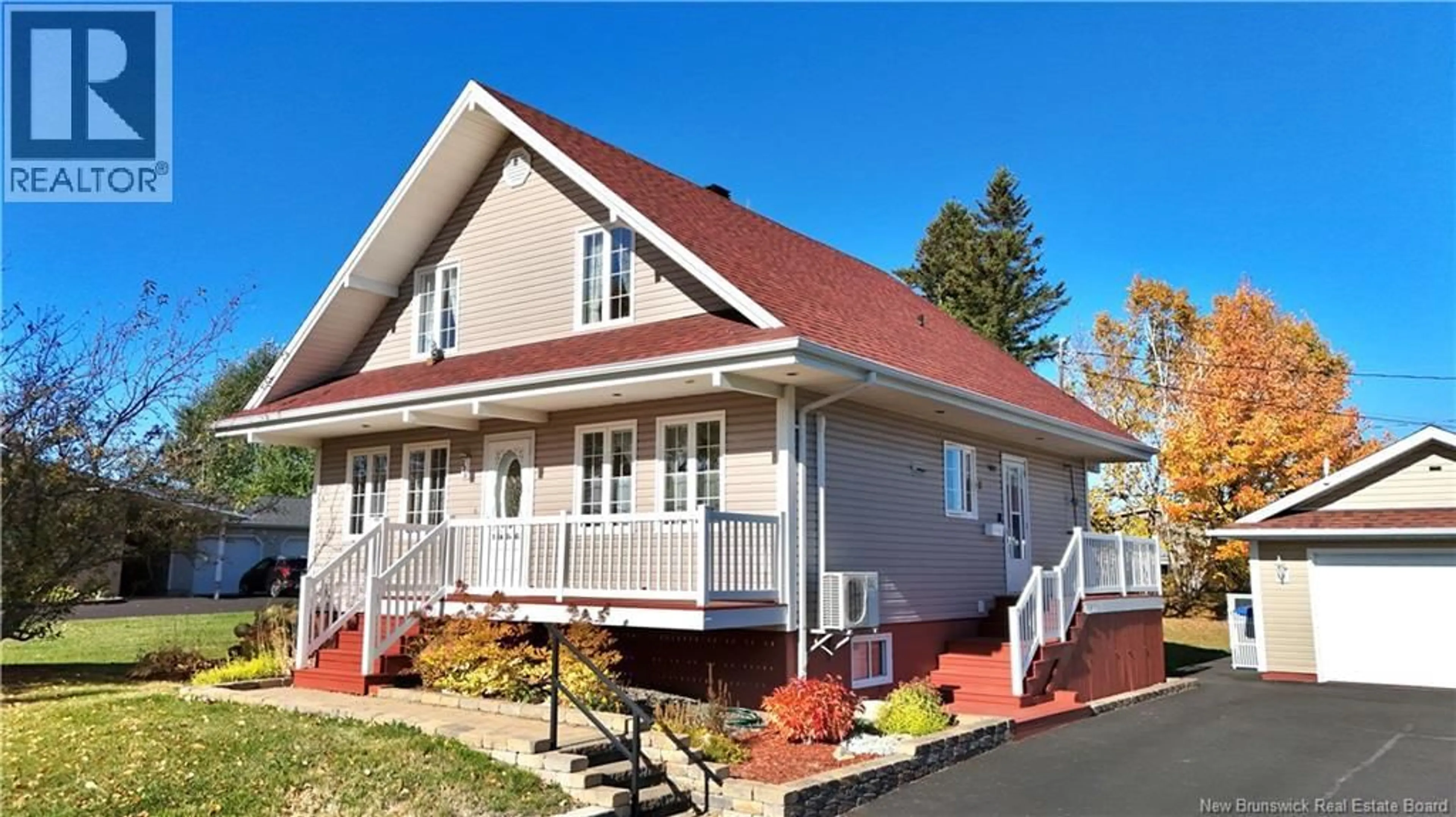 Home with vinyl exterior material, street for 220 FRANCINE, Beresford New Brunswick E8K1N8
