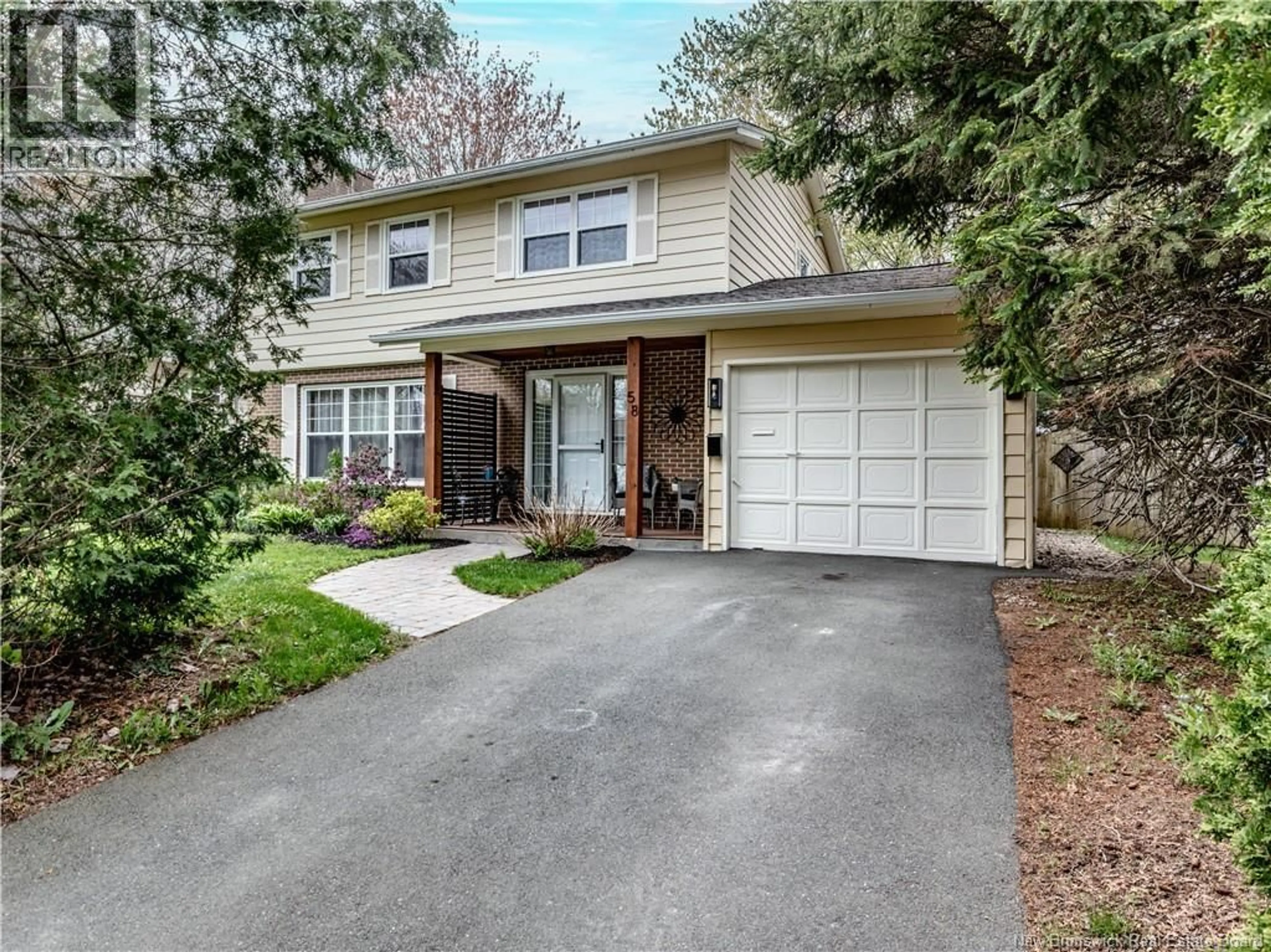 Home with vinyl exterior material, street for 58 BRIARWOOD, Moncton New Brunswick E1E3X2