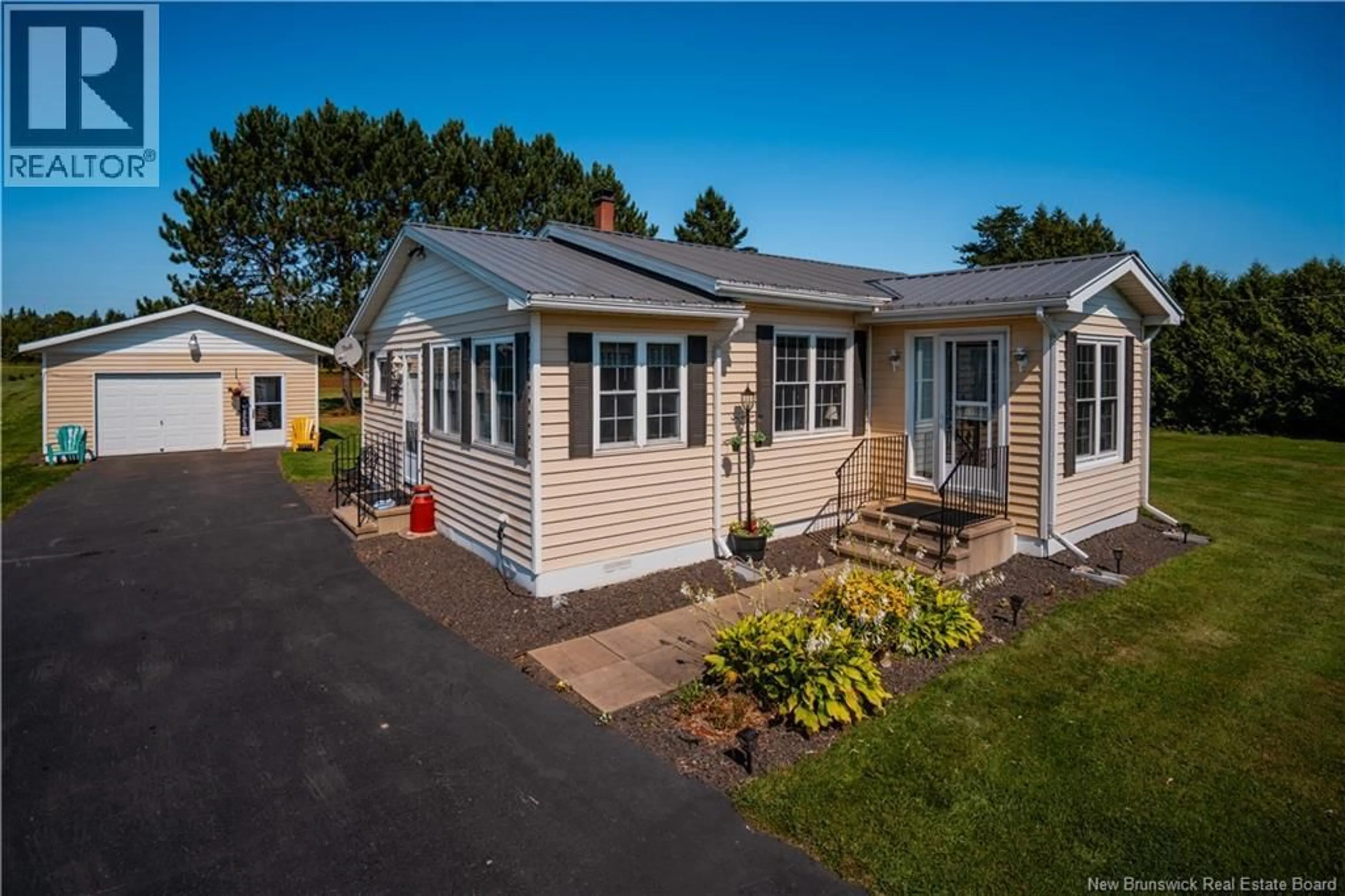 Home with vinyl exterior material, street for 6317 ROUTE 10, Upper Salmon Creek New Brunswick E4A1E2