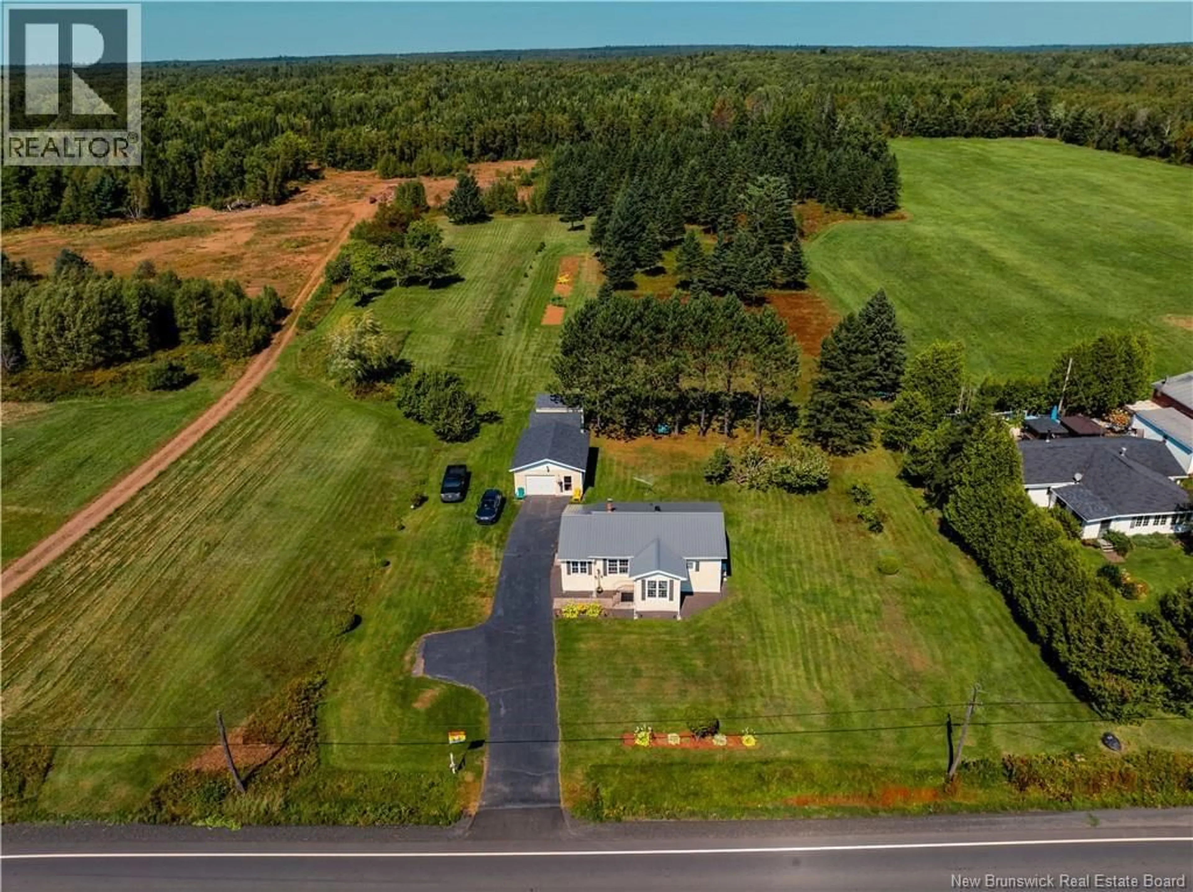 A pic from outside/outdoor area/front of a property/back of a property/a pic from drone, water/lake/river/ocean view for 6317 ROUTE 10, Upper Salmon Creek New Brunswick E4A1E2