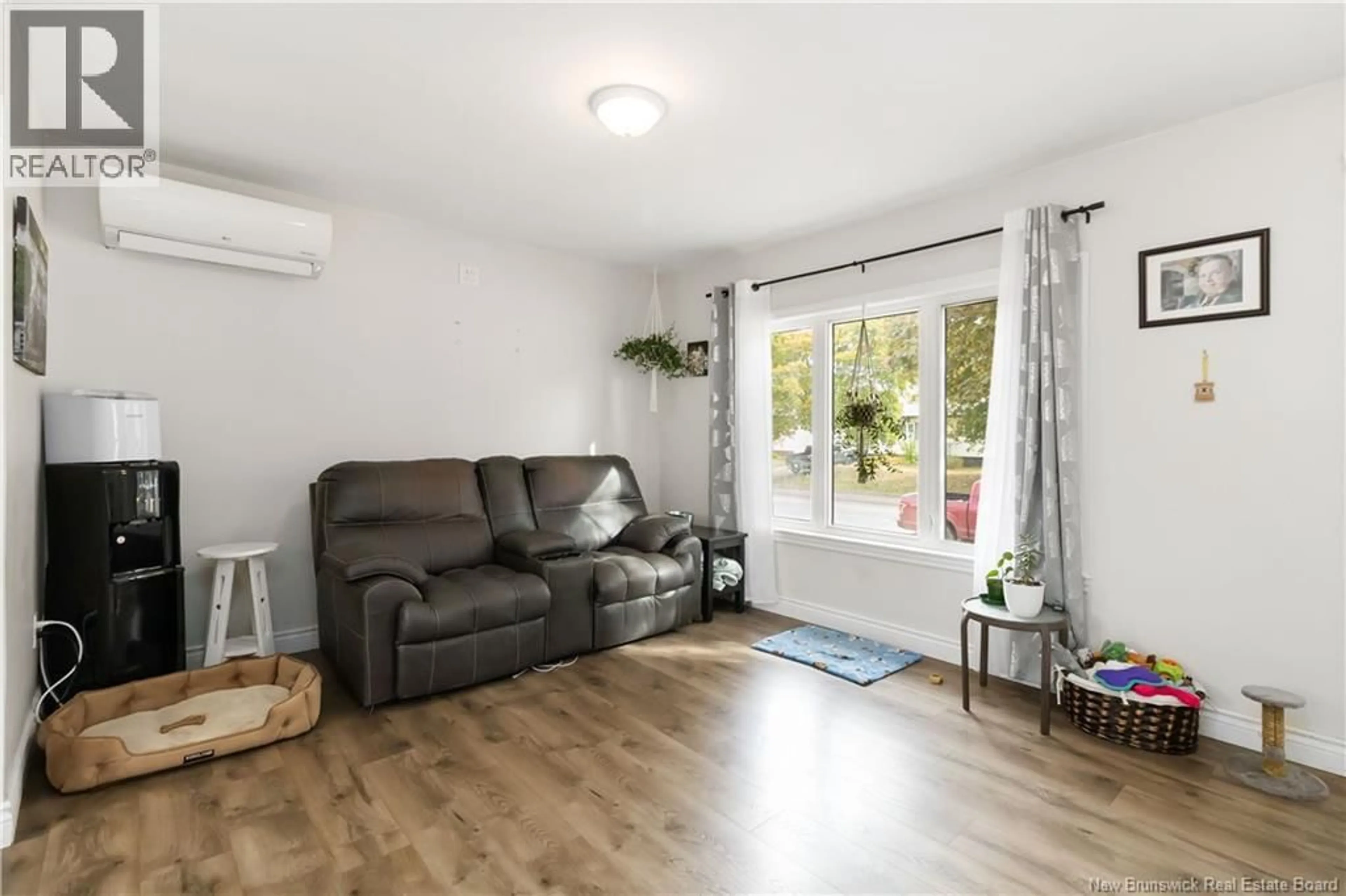 Living room with furniture, wood/laminate floor for 270 WHITEPINE, Riverview New Brunswick E1B3M2