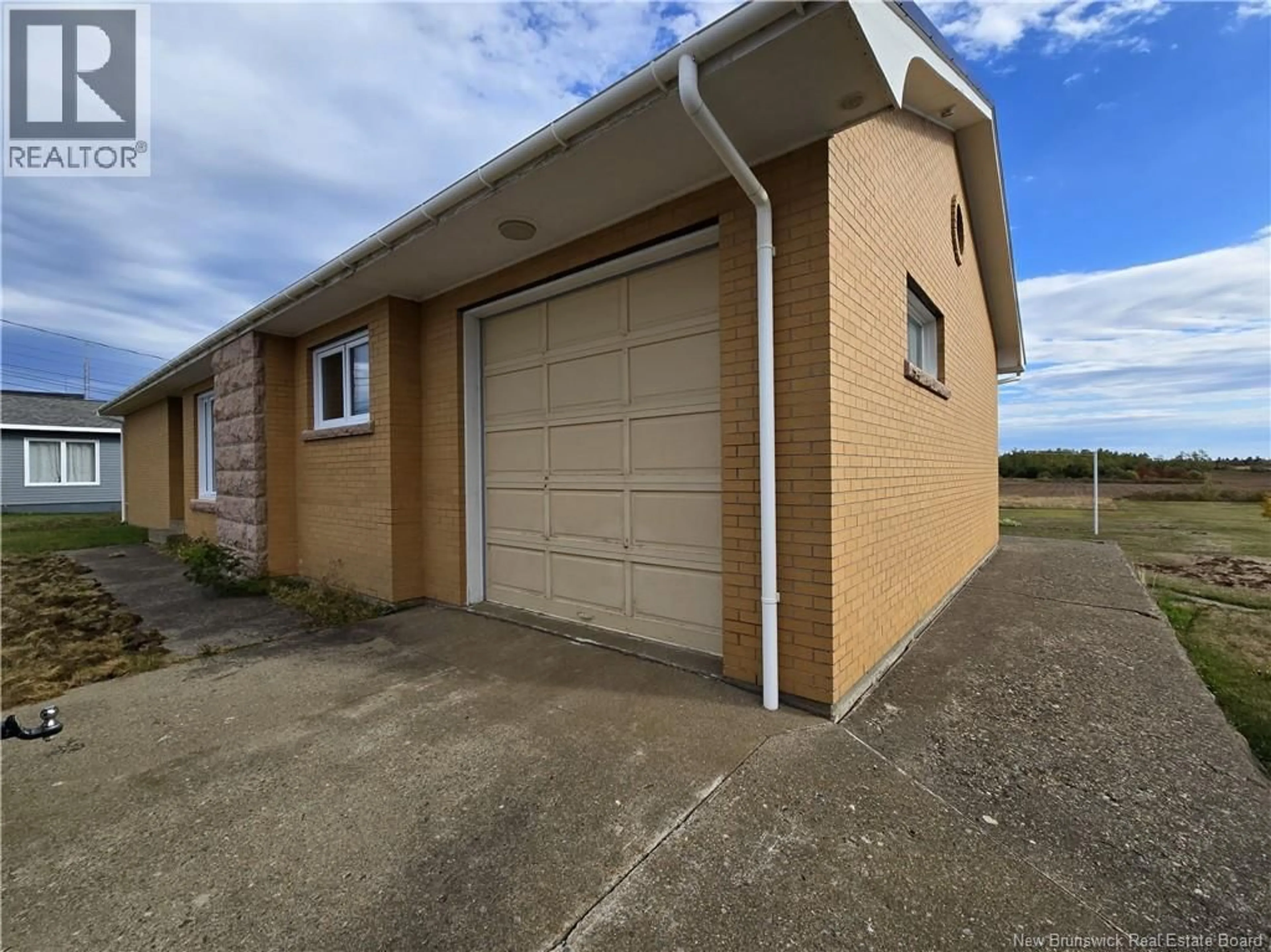 A pic from outside/outdoor area/front of a property/back of a property/a pic from drone, building for 301 ACADIE STREET, Grande-Anse New Brunswick E8N1B9