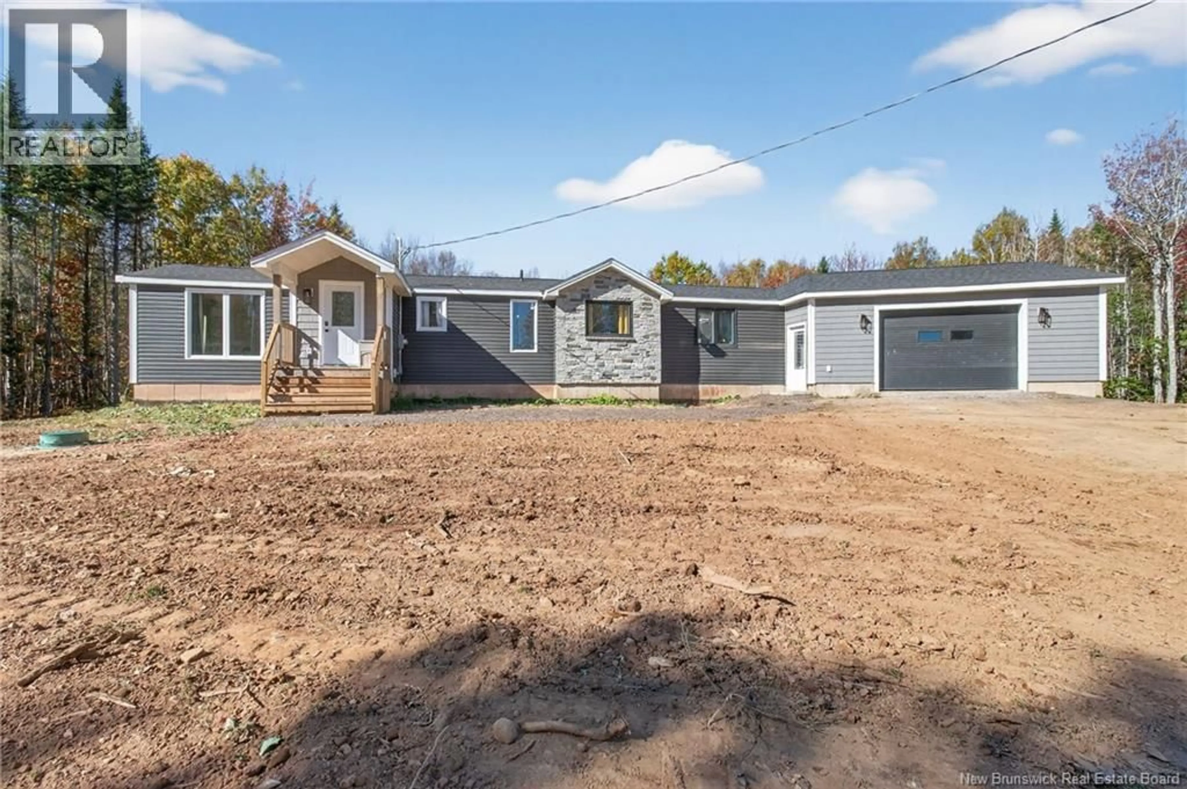Home with vinyl exterior material, street for 85 ROY SCENIC DRIVE, Irishtown New Brunswick E1H2N5