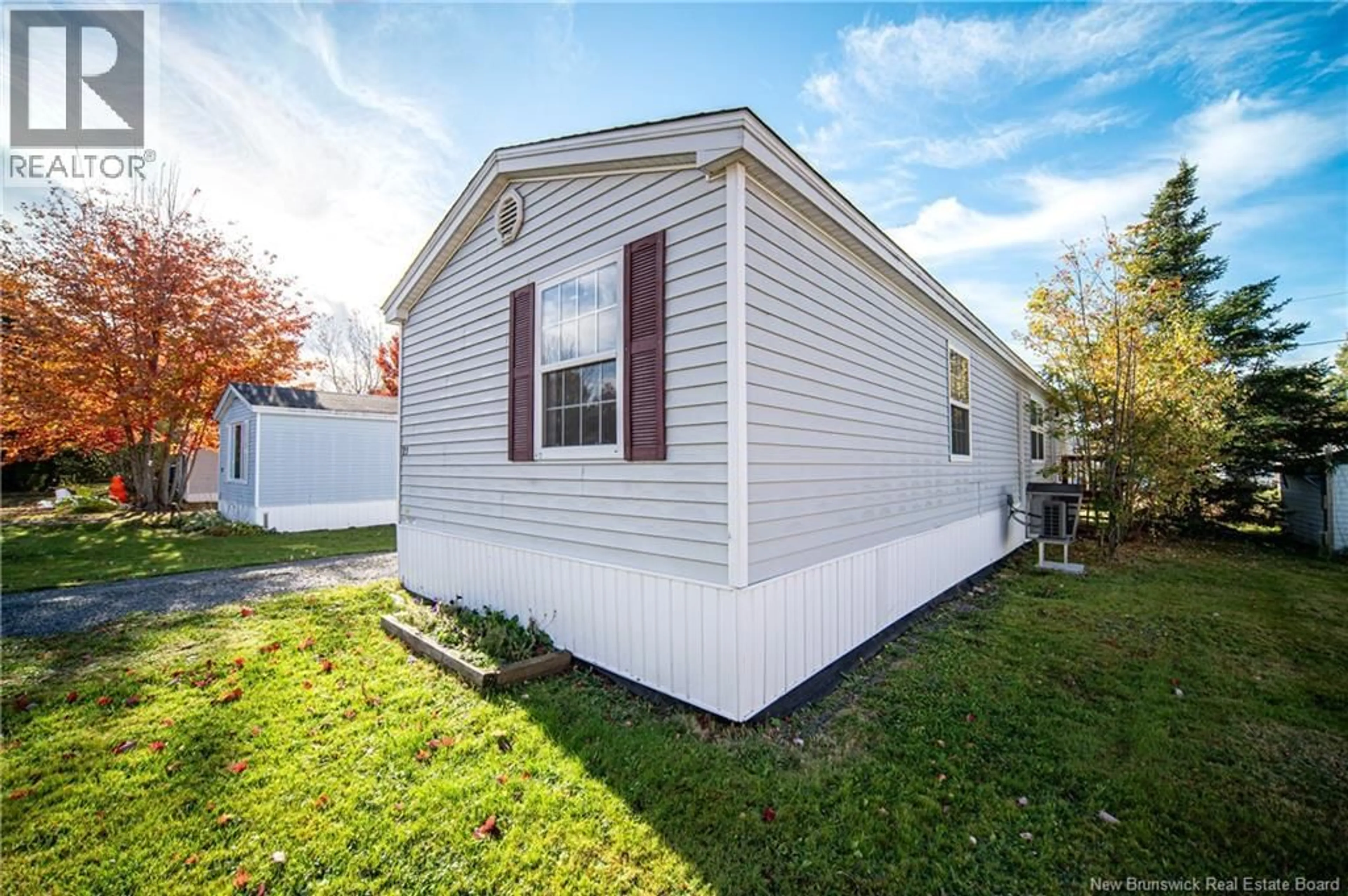 Home with vinyl exterior material, street for 21 RAMSEY STREET, Lincoln New Brunswick E3B6X1
