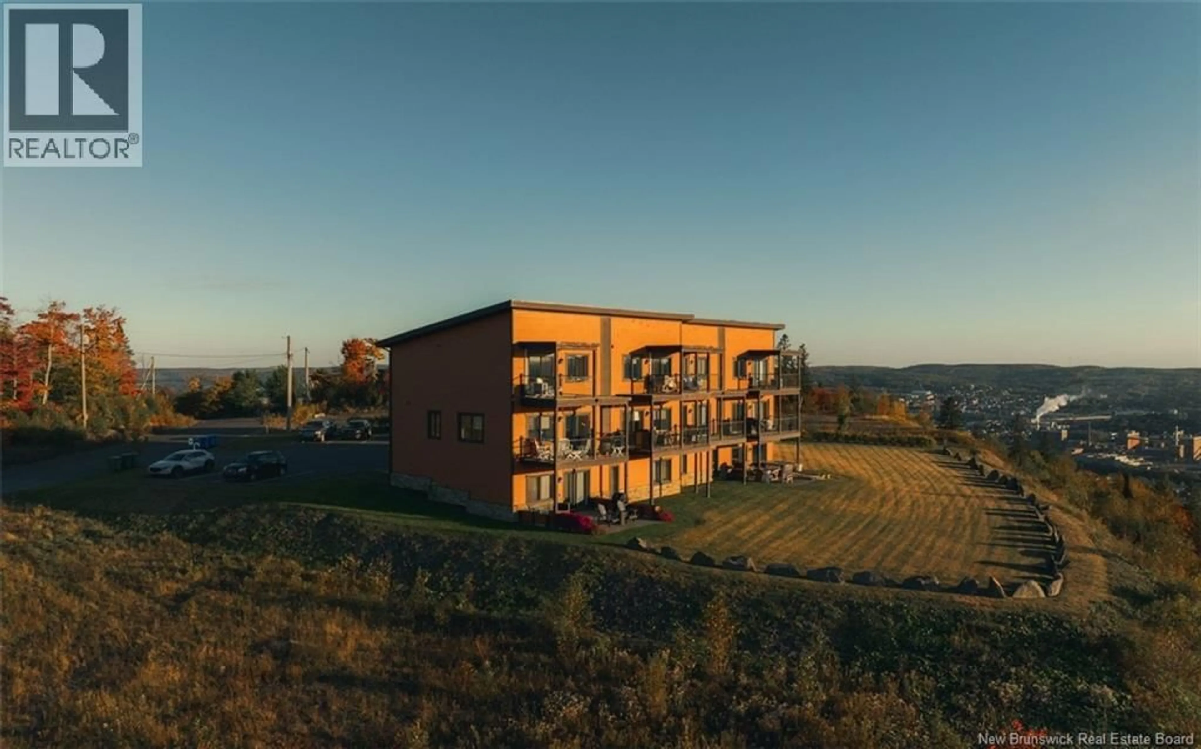 A pic from outside/outdoor area/front of a property/back of a property/a pic from drone, building for 201 - 112 DE LA FALAISE STREET, Edmundston New Brunswick E3V0C4
