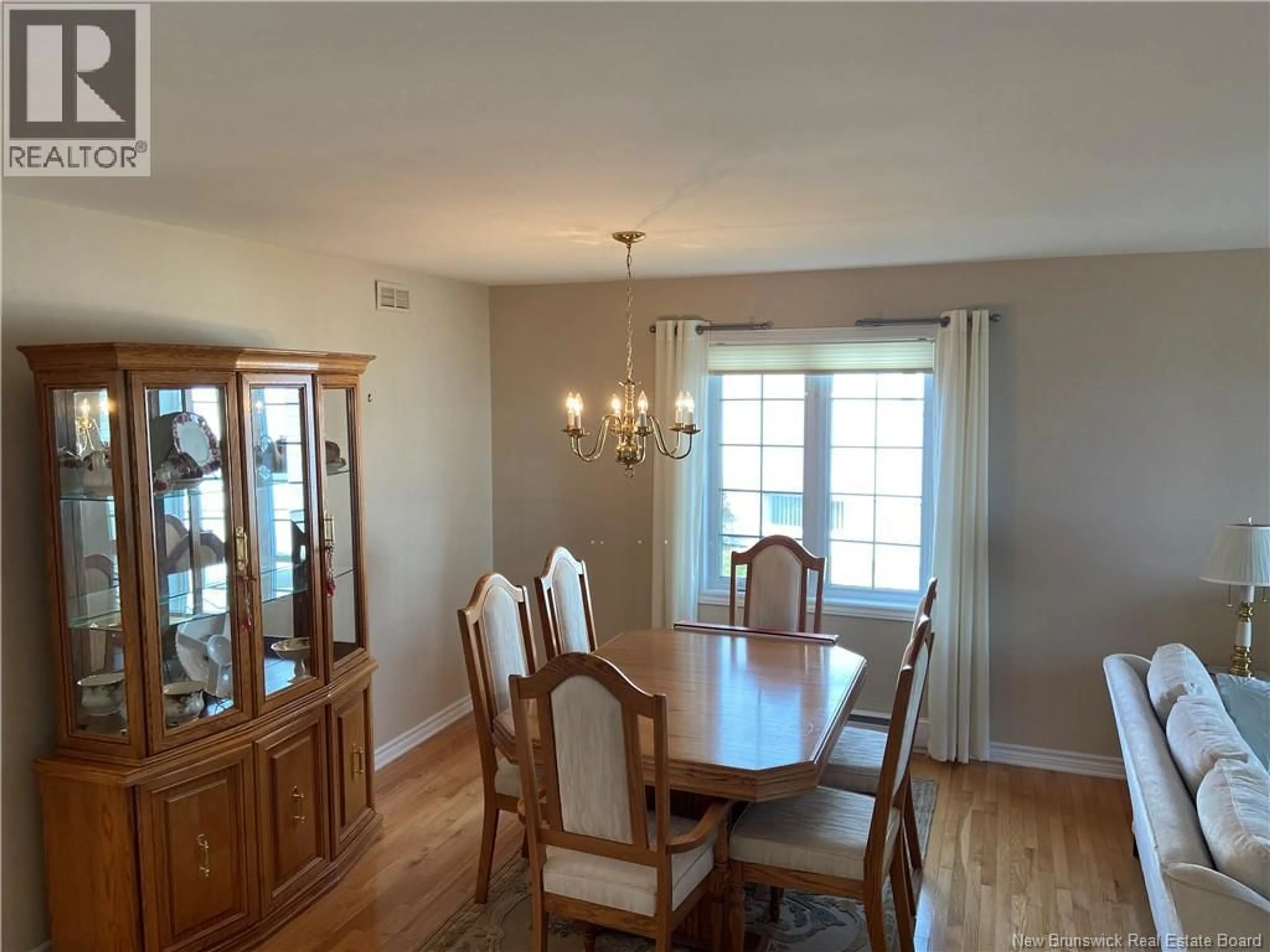 Dining room, wood/laminate floor for 7 WHITE HOUSE COURT, Saint John New Brunswick E2M5Z8