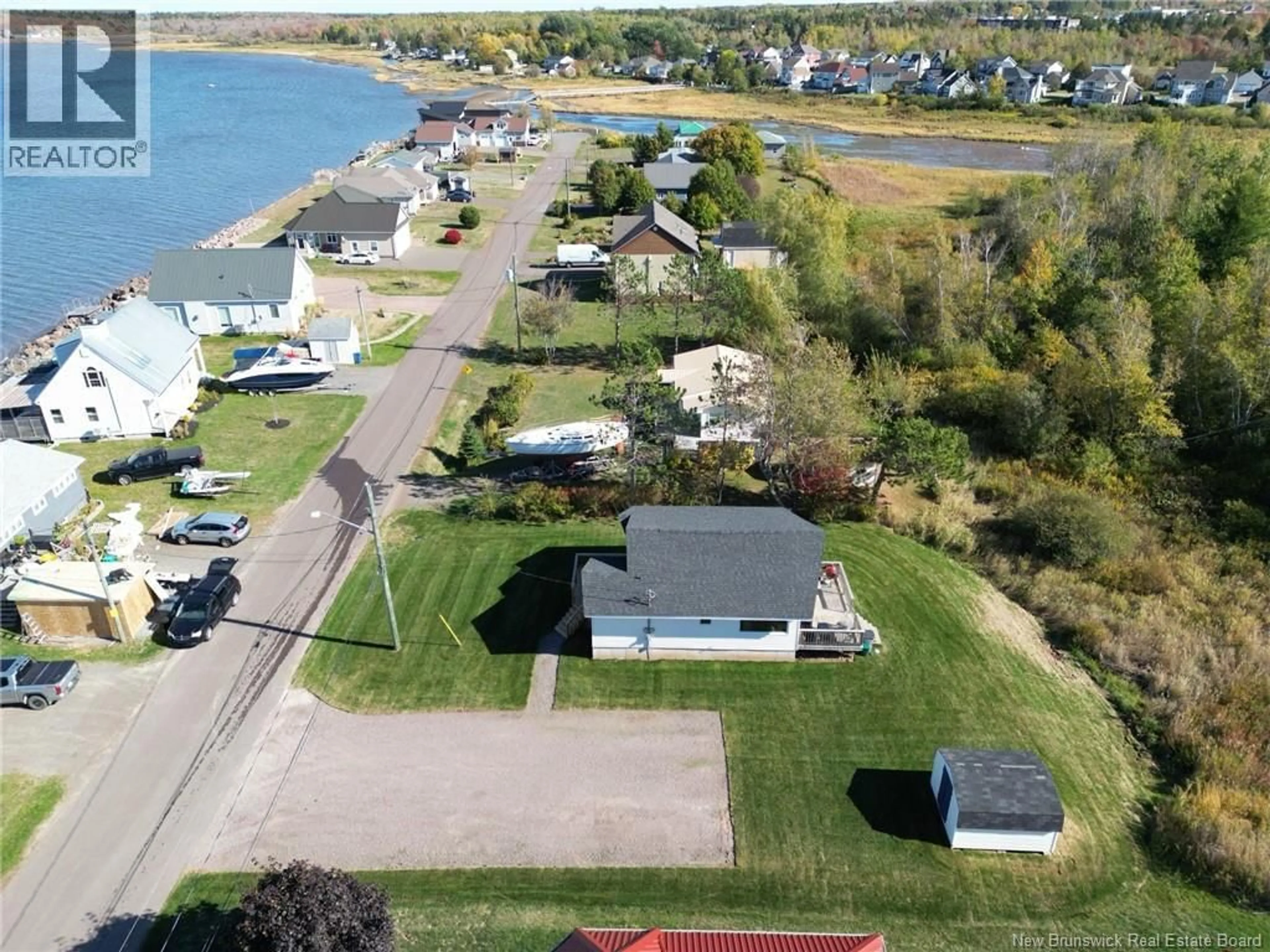 A pic from outside/outdoor area/front of a property/back of a property/a pic from drone, water/lake/river/ocean view for 443 PATUREL, Shediac New Brunswick E4P2L2