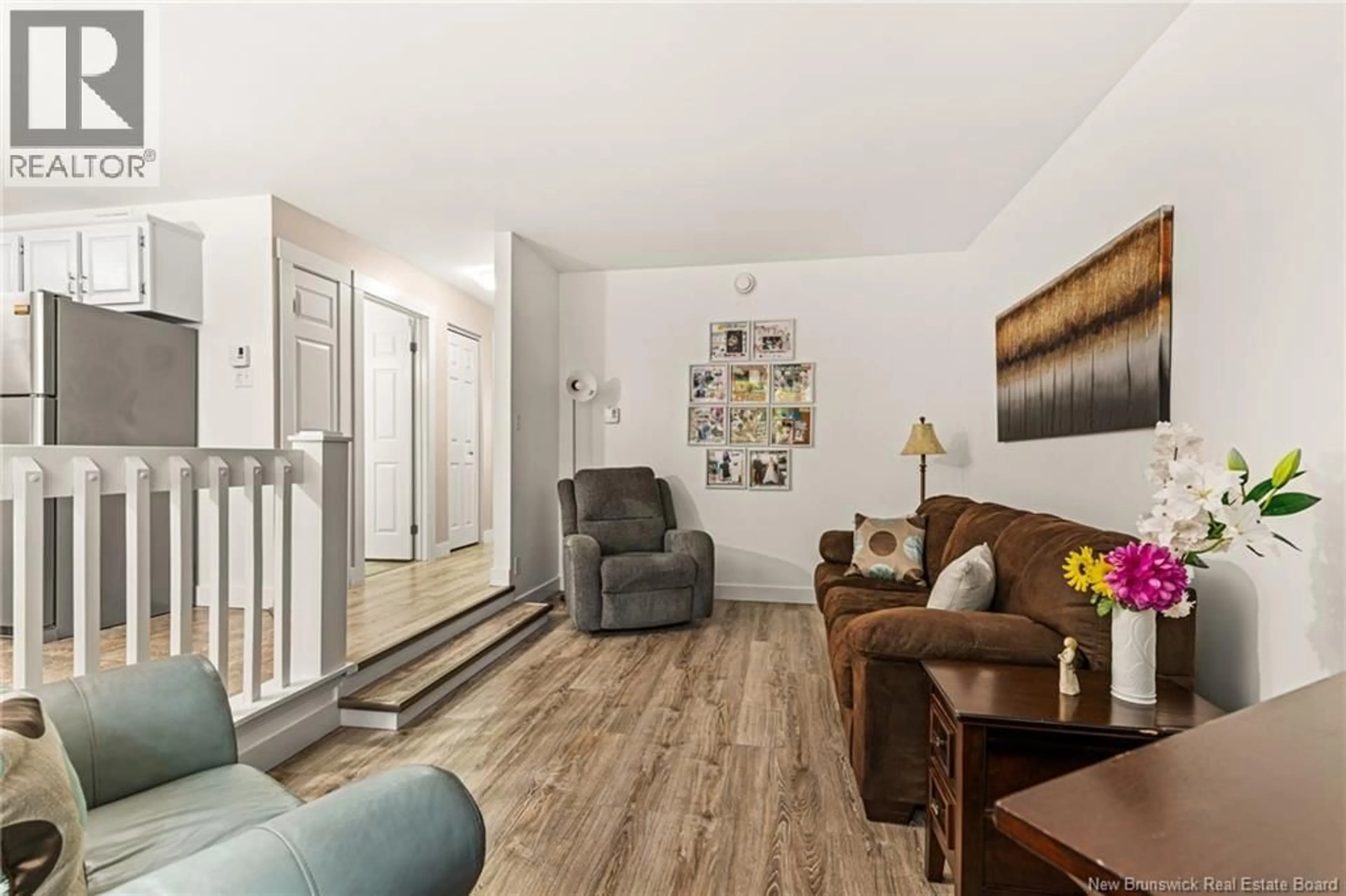 Living room with furniture, wood/laminate floor for 12 - 47 BIGGS DRIVE, Riverview New Brunswick E1B3Y8