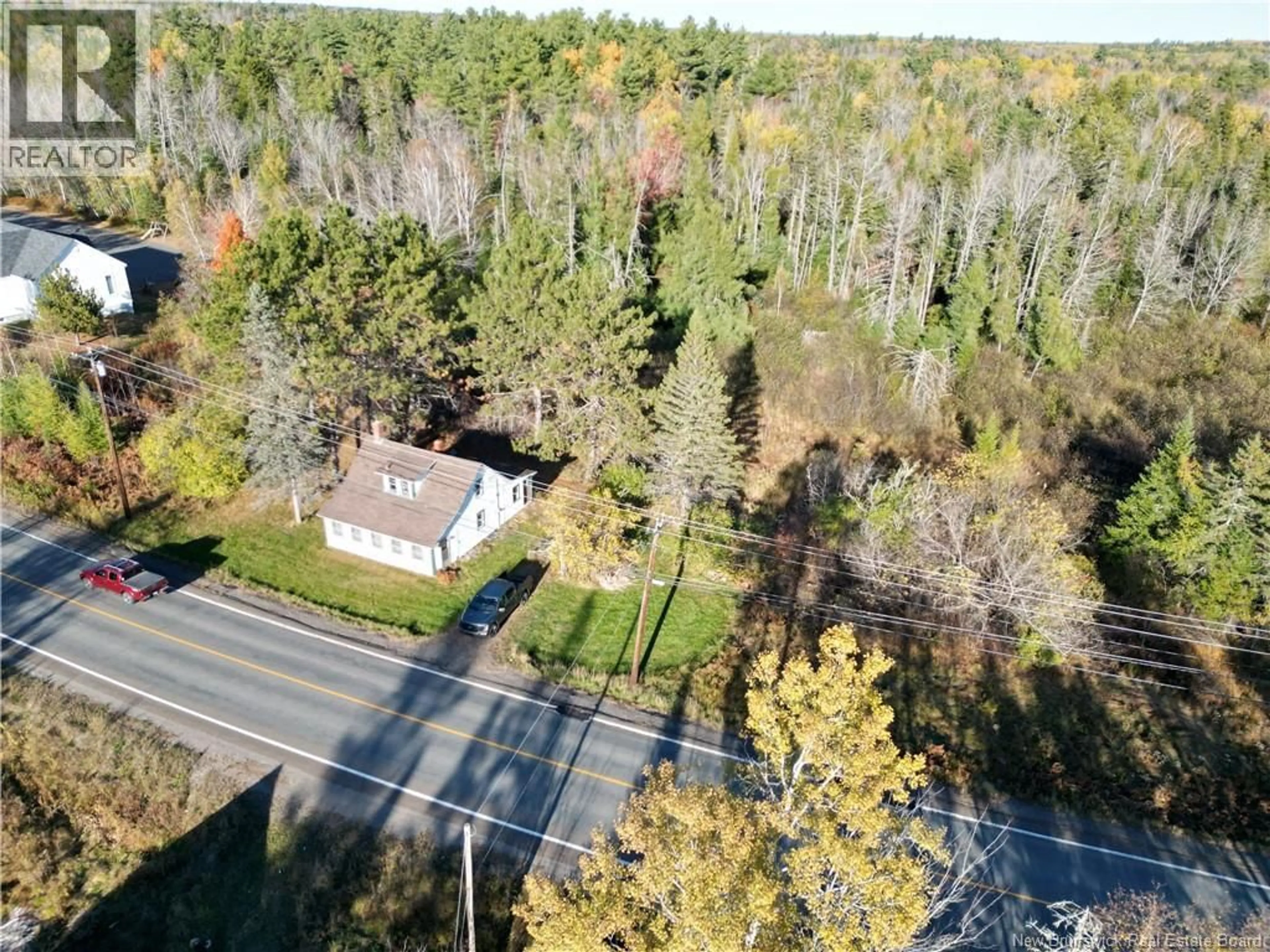 A pic from outside/outdoor area/front of a property/back of a property/a pic from drone, forest/trees view for 101 - 889 NASONWORTH, Charters Settlement New Brunswick E3C2C1
