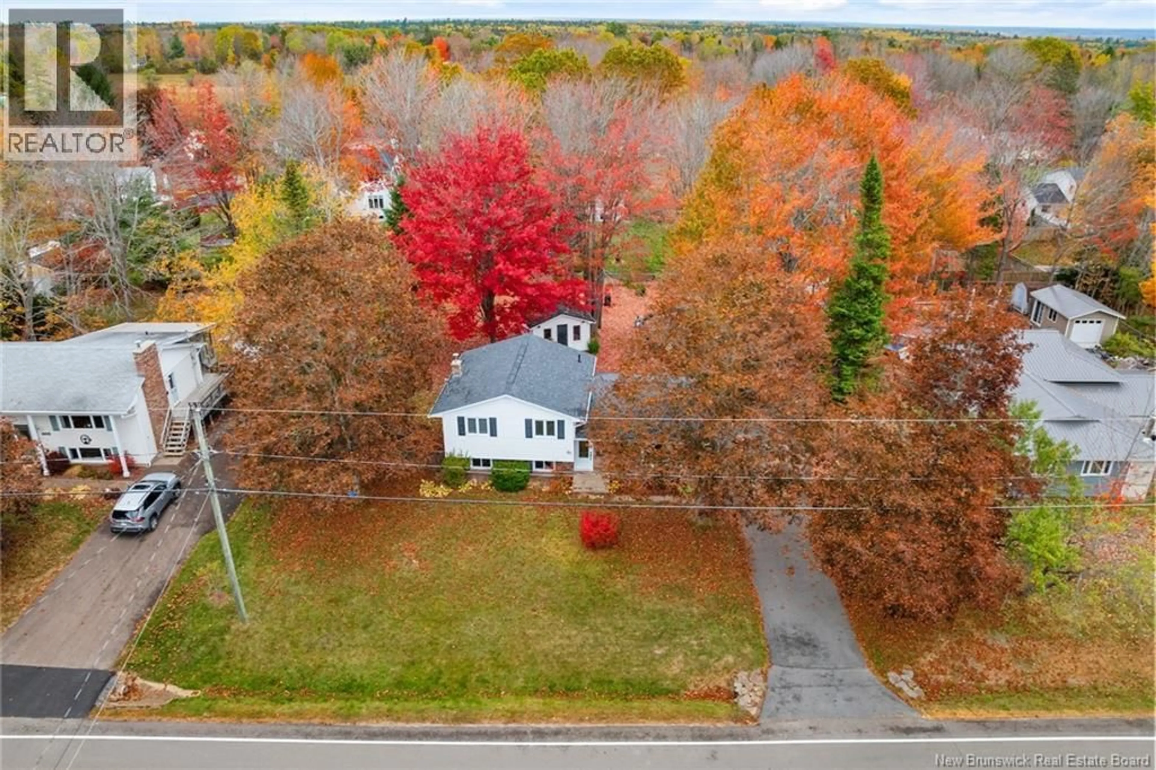 A pic from outside/outdoor area/front of a property/back of a property/a pic from drone, unknown for 91 BRADSHAW DRIVE, New Maryland New Brunswick E3C1H1