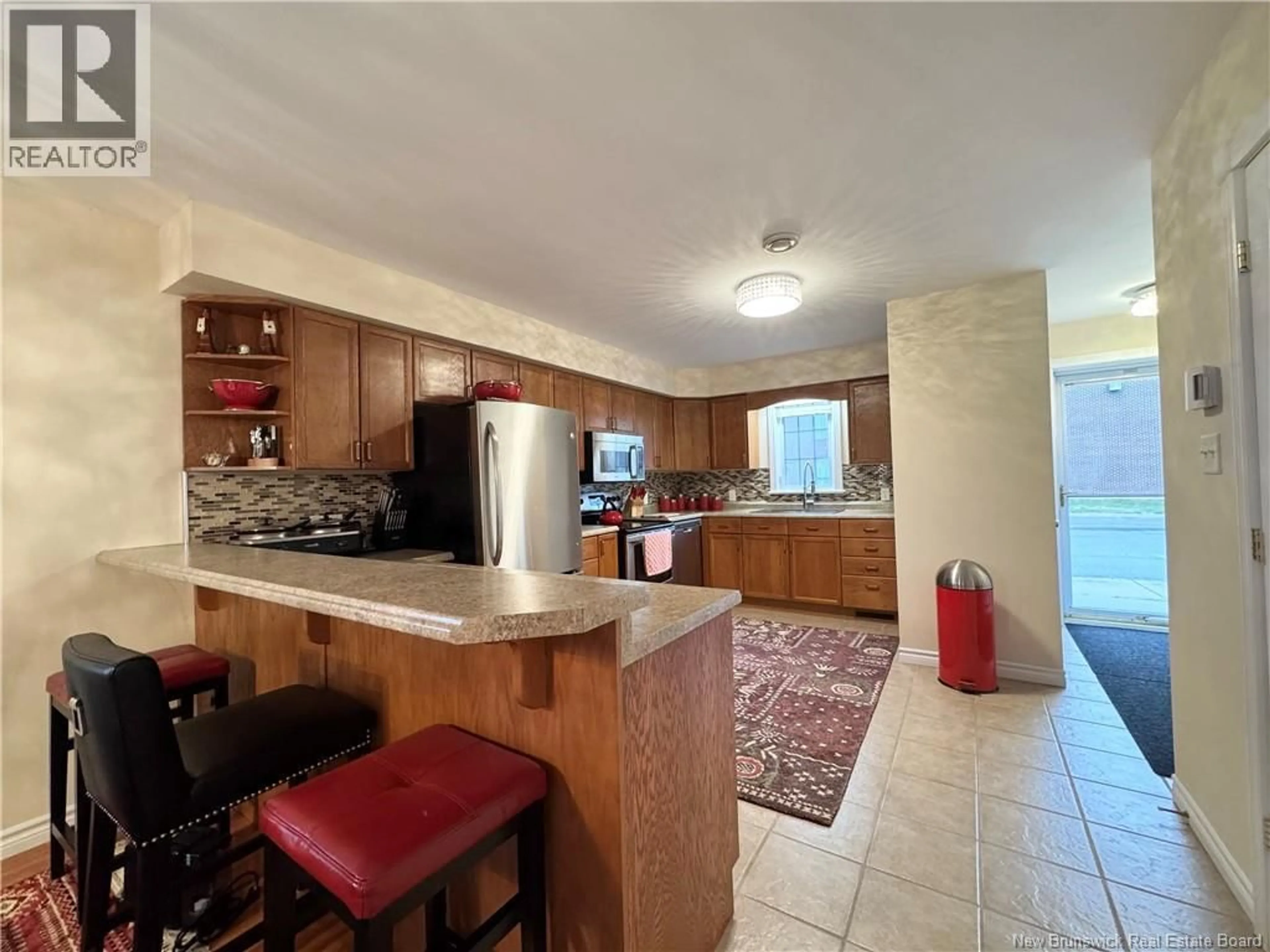 Open concept kitchen, ceramic/tile floor for 1 - 500 RIVERSIDE DRIVE DRIVE, Fredericton New Brunswick E3A8C2