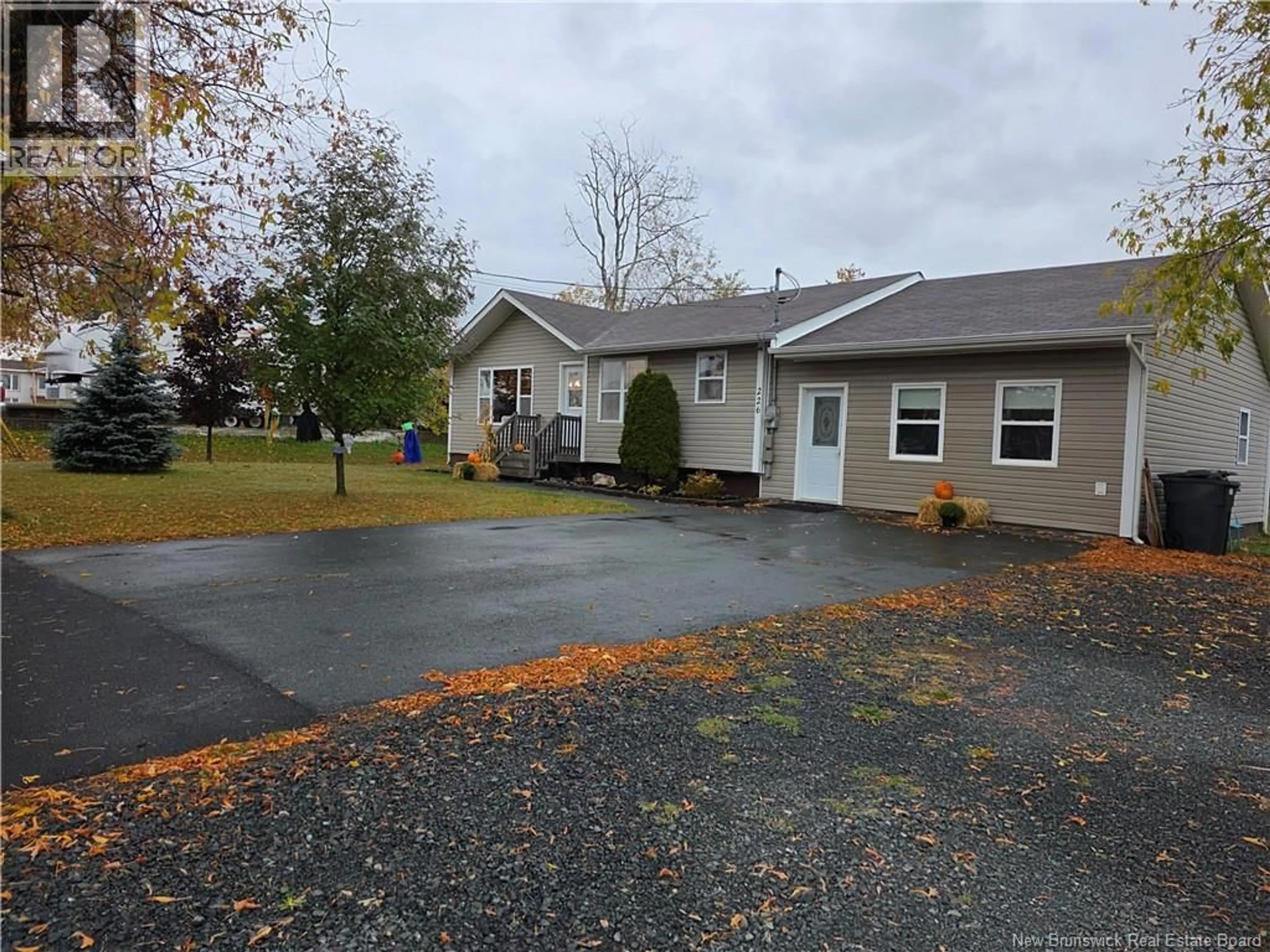 A pic from outside/outdoor area/front of a property/back of a property/a pic from drone, street for 226 GAGNON, Beresford New Brunswick E8K1V3