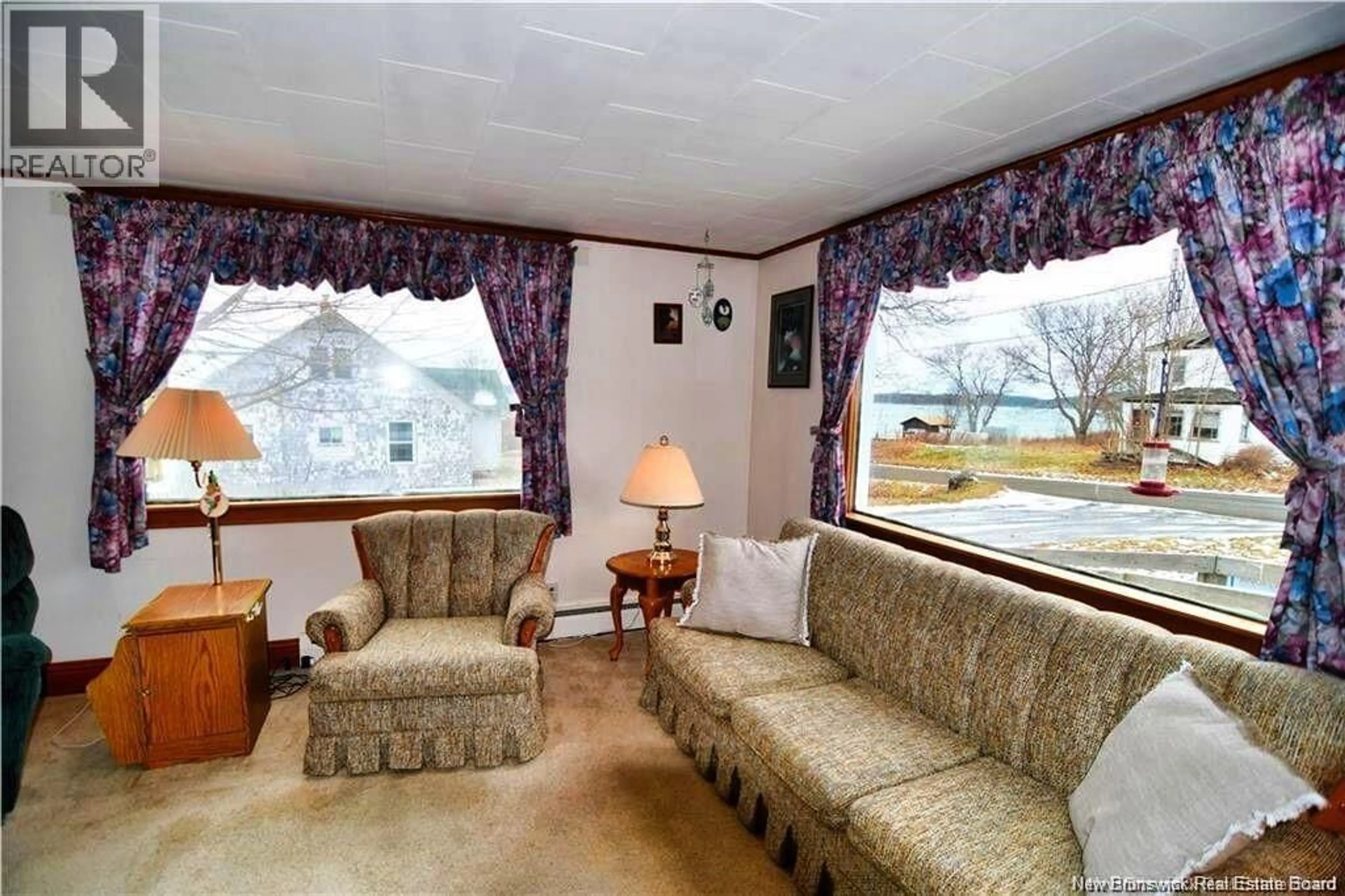 Living room with furniture, carpet floor for 9 COOKS POINT ROAD, Wilsons Beach New Brunswick E5E1V3