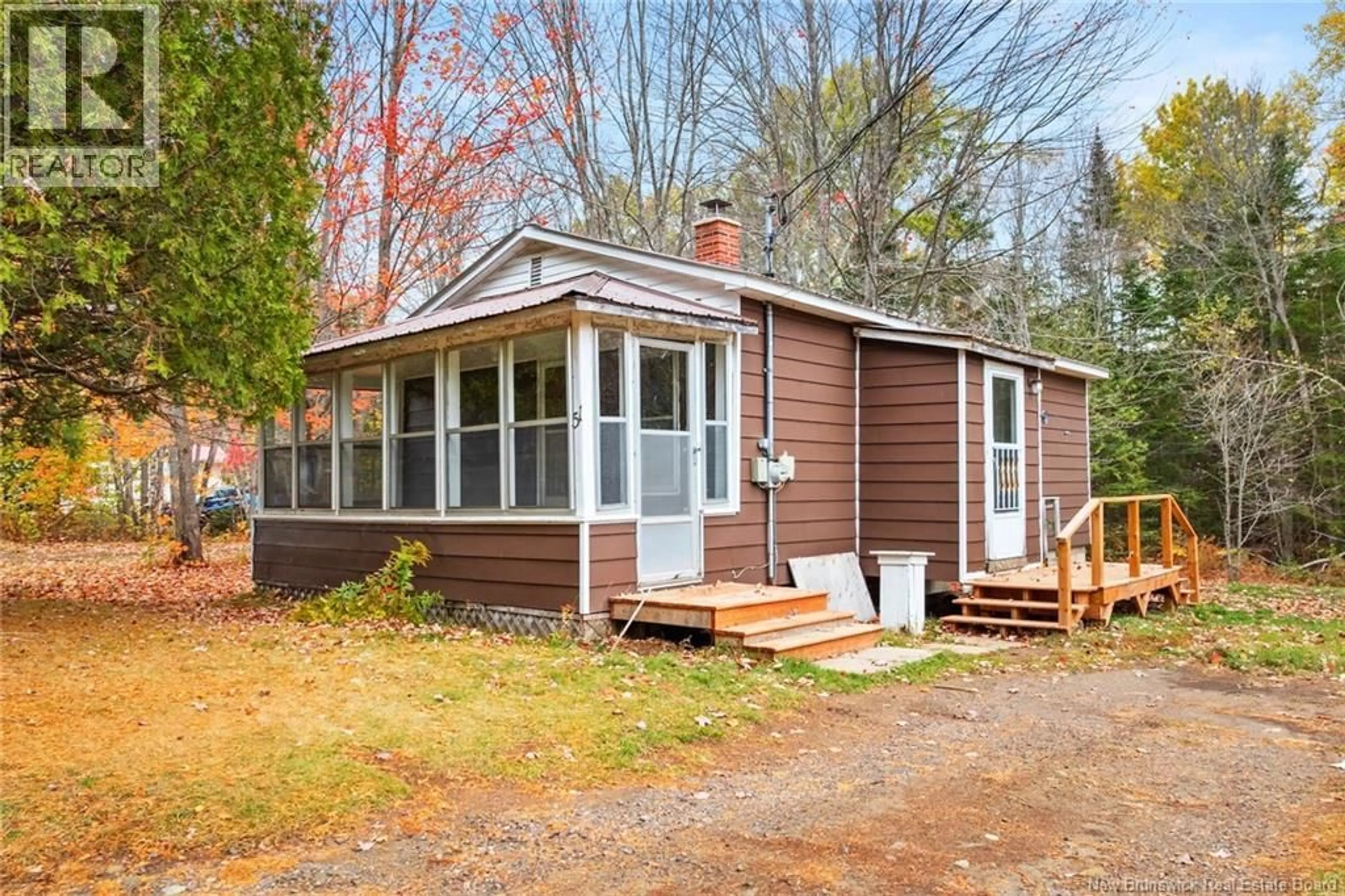 Home with vinyl exterior material, street for 51 DUFFERIN ROAD, Chipman New Brunswick E4A3X3
