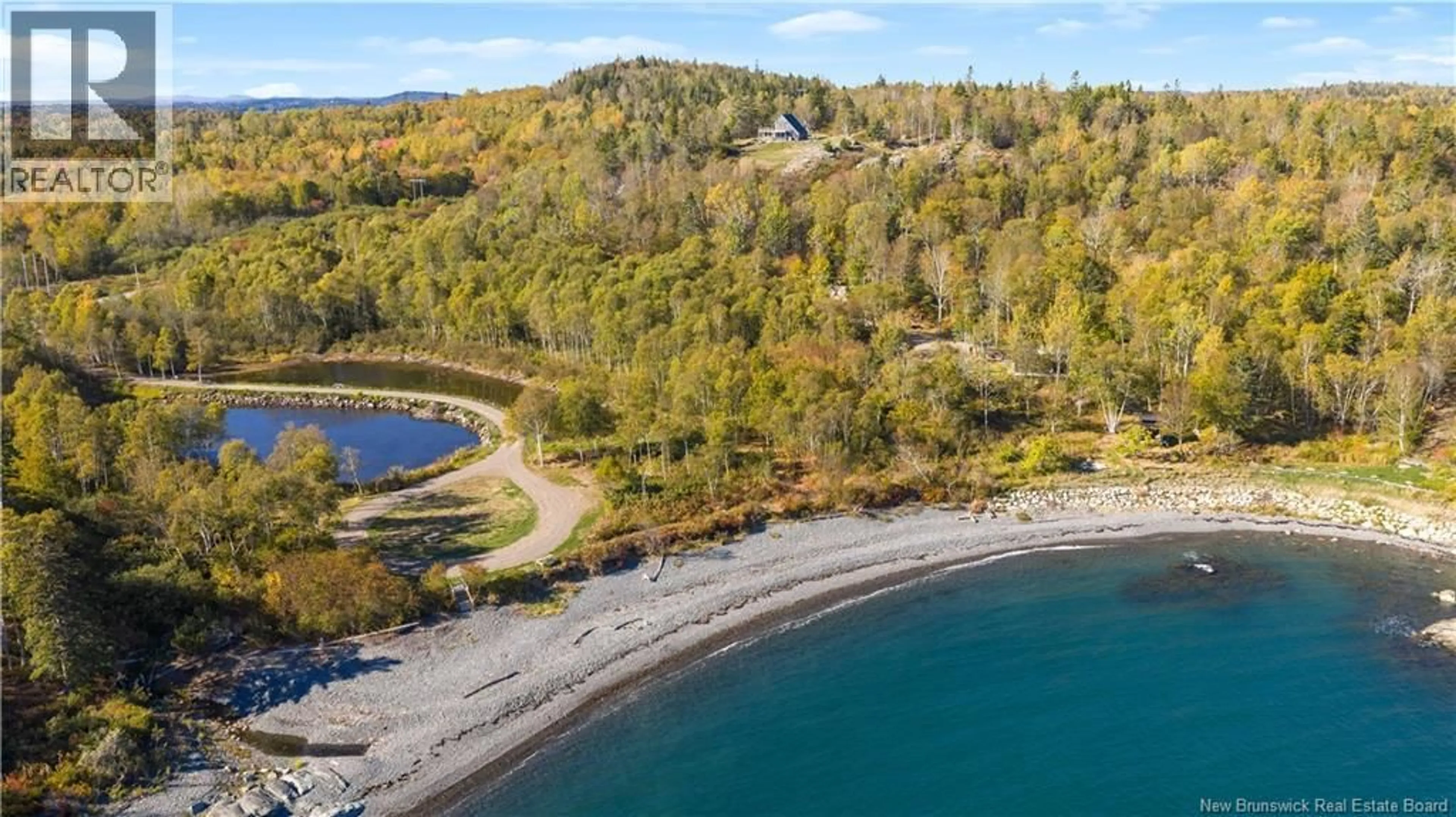 A pic from outside/outdoor area/front of a property/back of a property/a pic from drone, water/lake/river/ocean view for 478 FUNDY DRIVE, Wilsons Beach New Brunswick E5E1X2