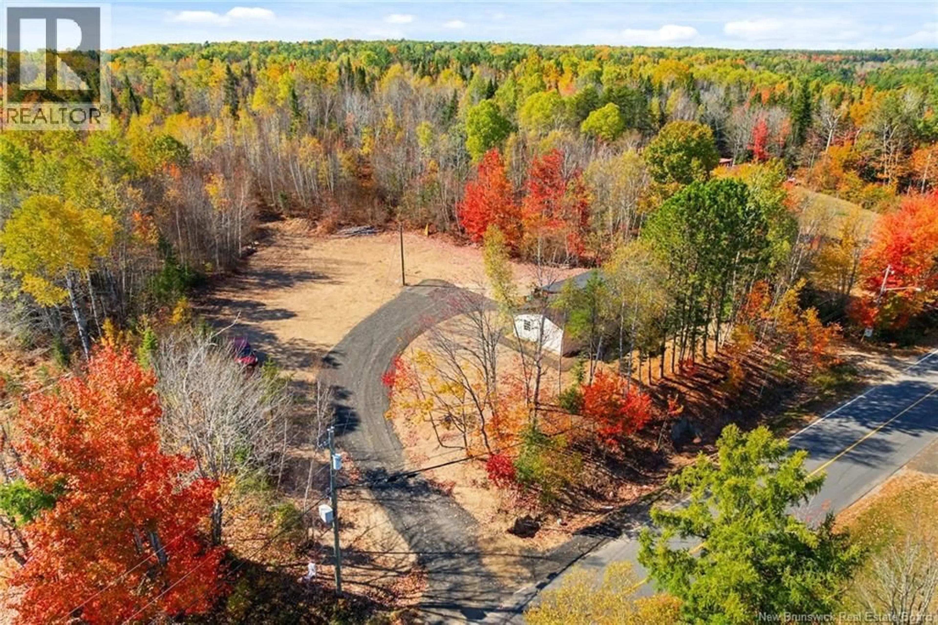 A pic from outside/outdoor area/front of a property/back of a property/a pic from drone, forest/trees view for 19 SLOPE ROAD, Minto New Brunswick E4B3G7